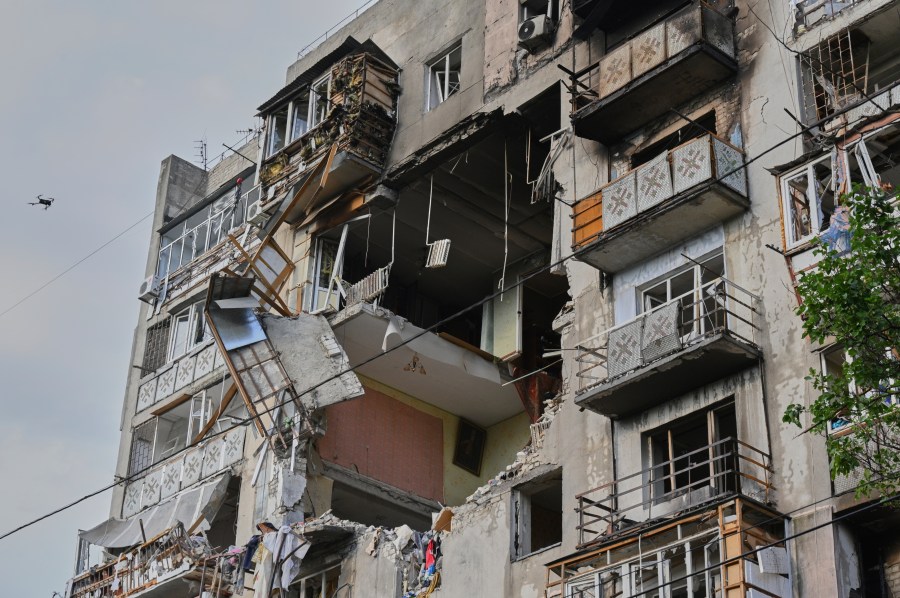 A residential building is damaged following Russia's drone attack in Odesa, Ukraine, Thursday, July 24, 2025. (AP Photo/Michael Shtekel)