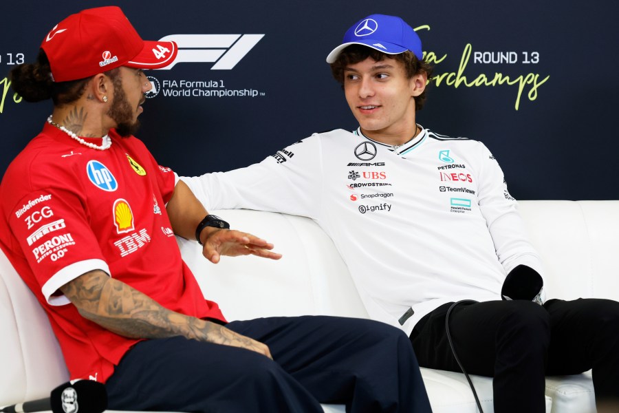 Mercedes driver Kimi Antonelli of Italy, right, and Ferrari driver Lewis Hamilton of Britain attend a media conference ahead of the Formula One Grand Prix at the Spa-Francorchamps racetrack in Spa, Belgium, Thursday, July 24, 2025. (AP Photo/Geert Vanden Wijngaert)
