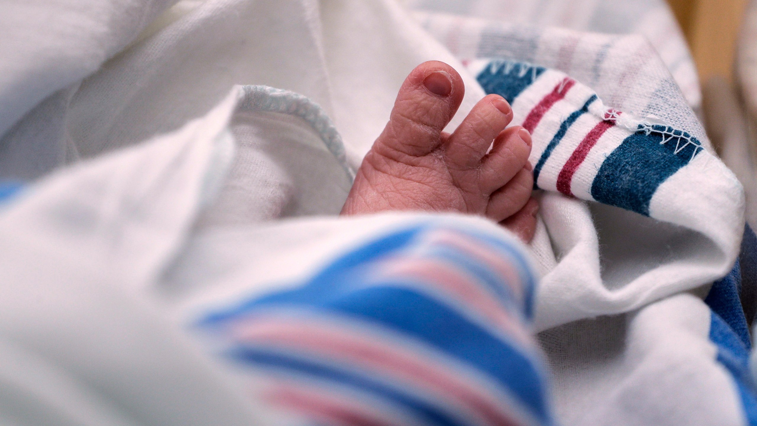 FILE - The toes of a baby are seen at a hospital in McAllen, Texas, on Wednesday, July 29, 2020. (AP Photo/Eric Gay, File)