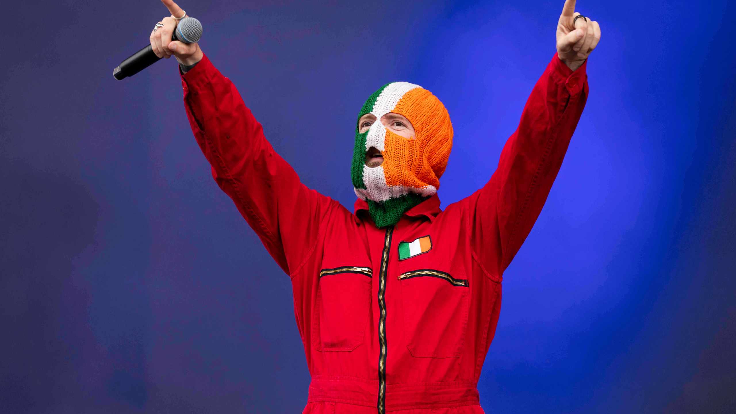 J. J. O Dochartaigh from the hip hop trio Kneecap in Finsbury Park on Saturday, July 5, 2025, in London. (Photo by Scott A Garfitt/Invision/AP)