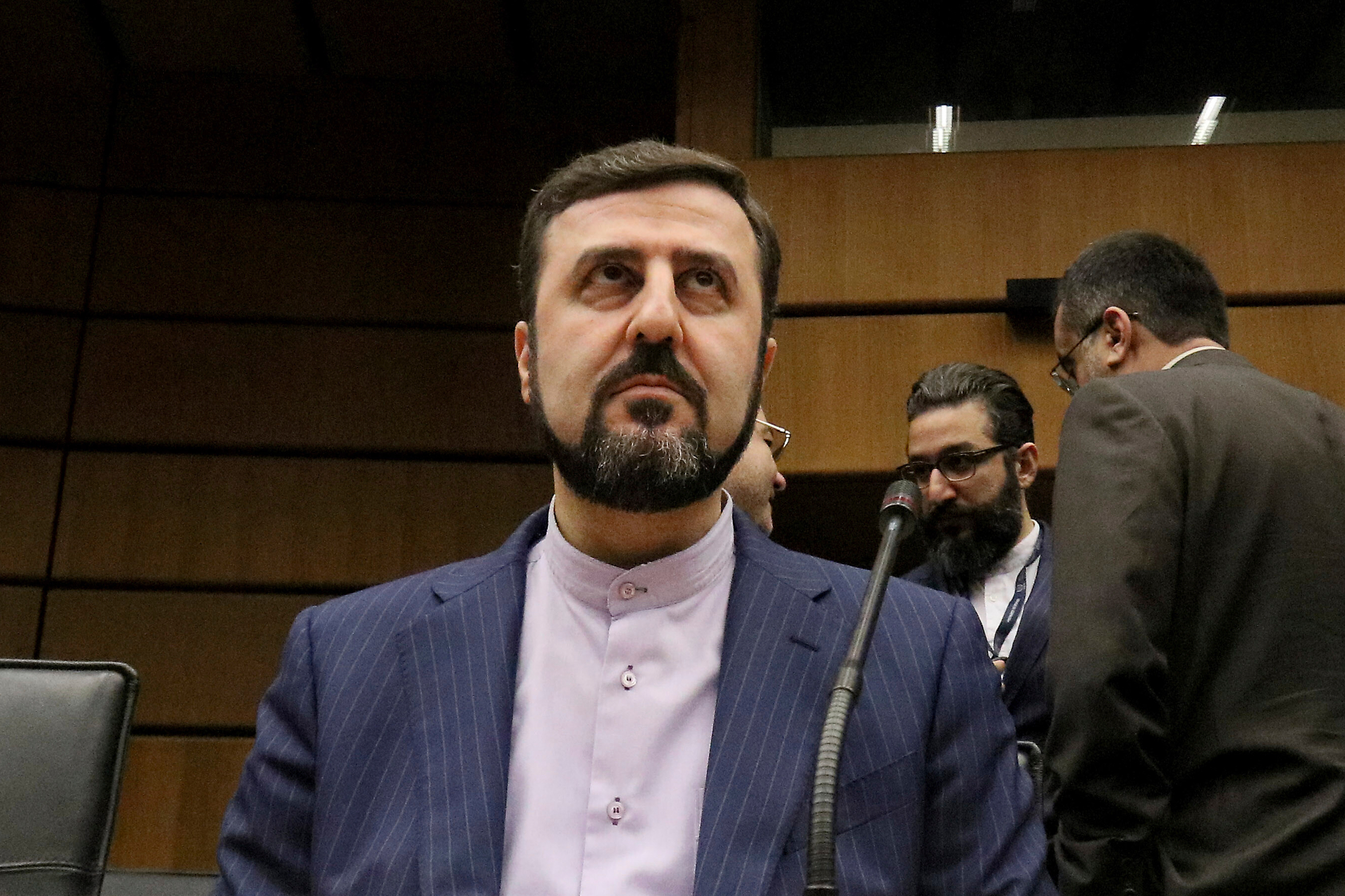 FILE - Iran's Ambassador to the International Atomic Energy Agency, IAEA, Kazem Gharibabadi, waits for the start of the IAEA board of governors meeting at the International Center in Vienna, Austria, Nov. 21, 2019. (AP Photo/Ronald Zak, file)