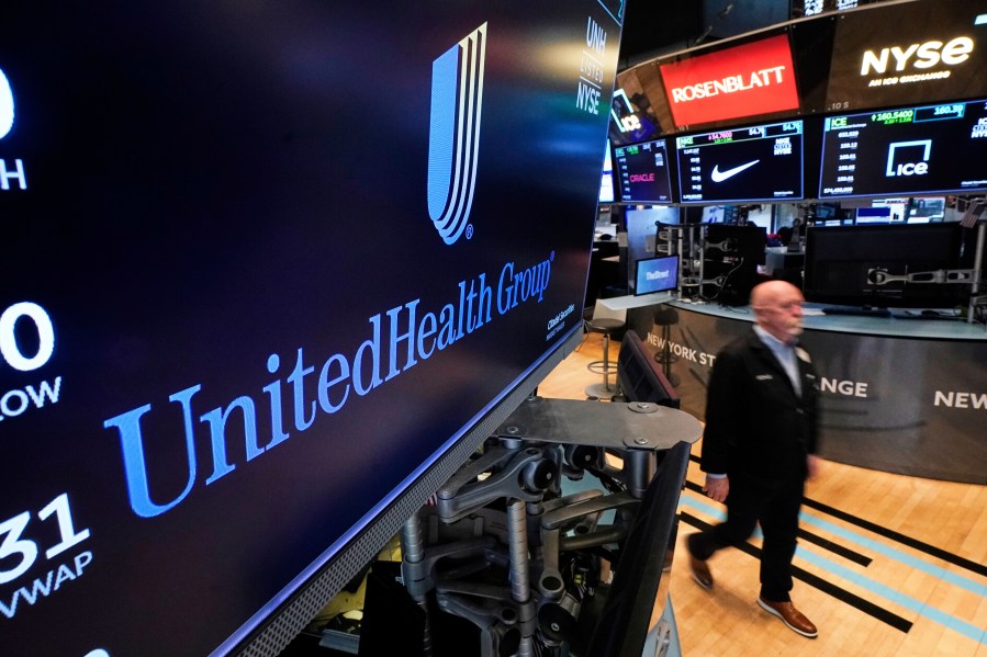 FILE - The logo for UnitedHealth Group appears above a trading post on the floor of the New York Stock Exchange, April 17, 2025. (AP Photo/Richard Drew, file)