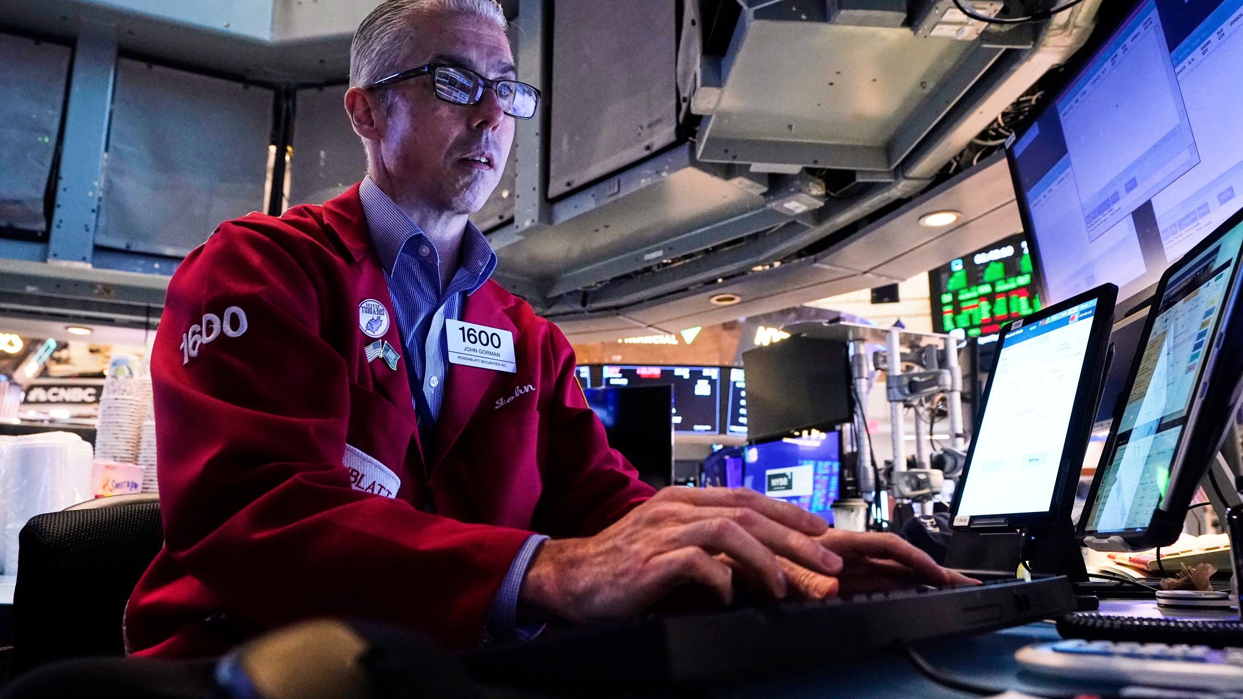 Trader John Gorman works on the floor of the New York Stock Exchange, Monday, July 21, 2025. (AP Photo/Richard Drew)