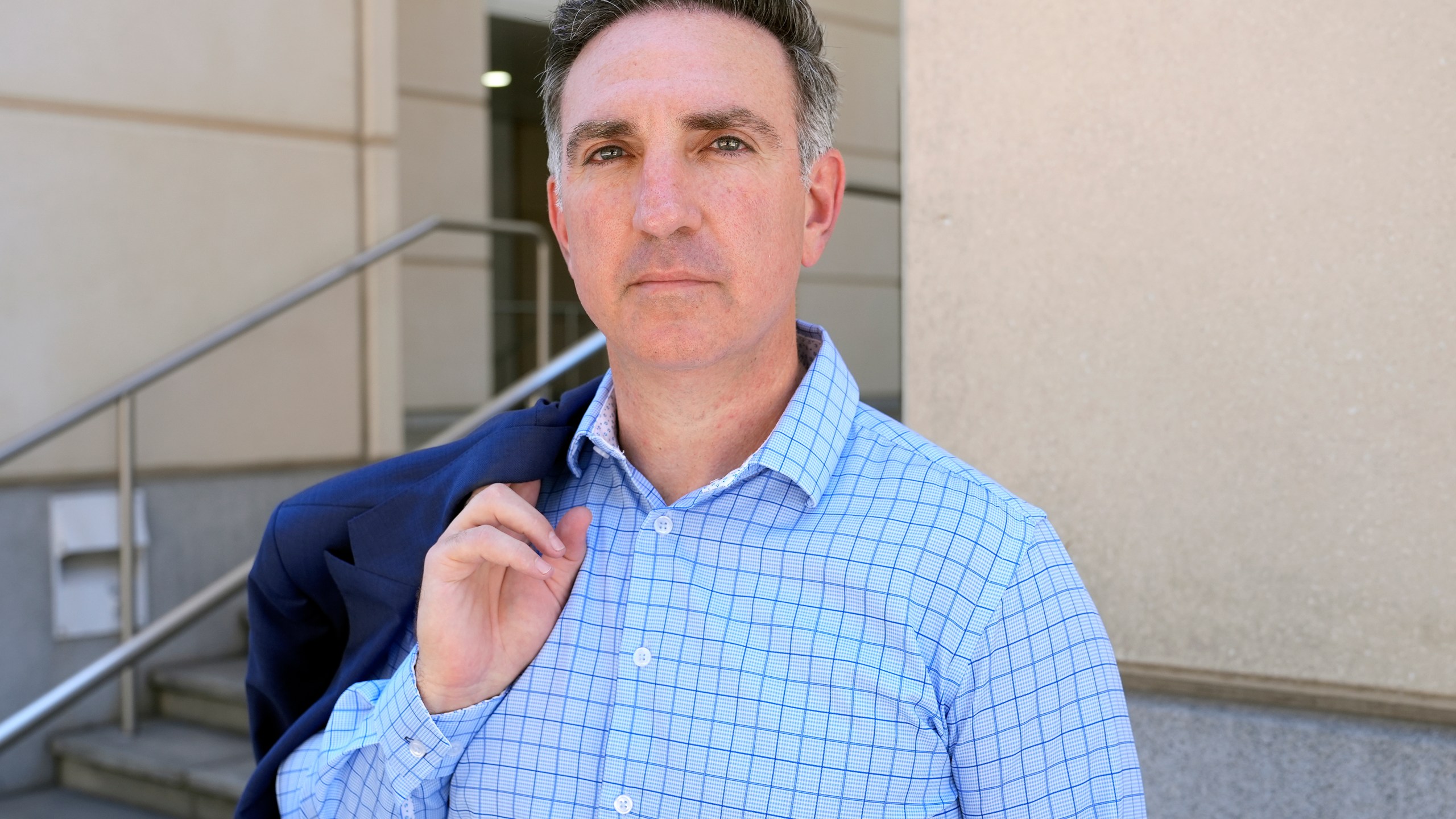 Former federal prosecutor Michael Gordon poses for a photo outside the Sam Gibbons United States Courthouse, Thursday, July 24, 2025, in Tampa, Fla. (AP Photo/Chris O'Meara)