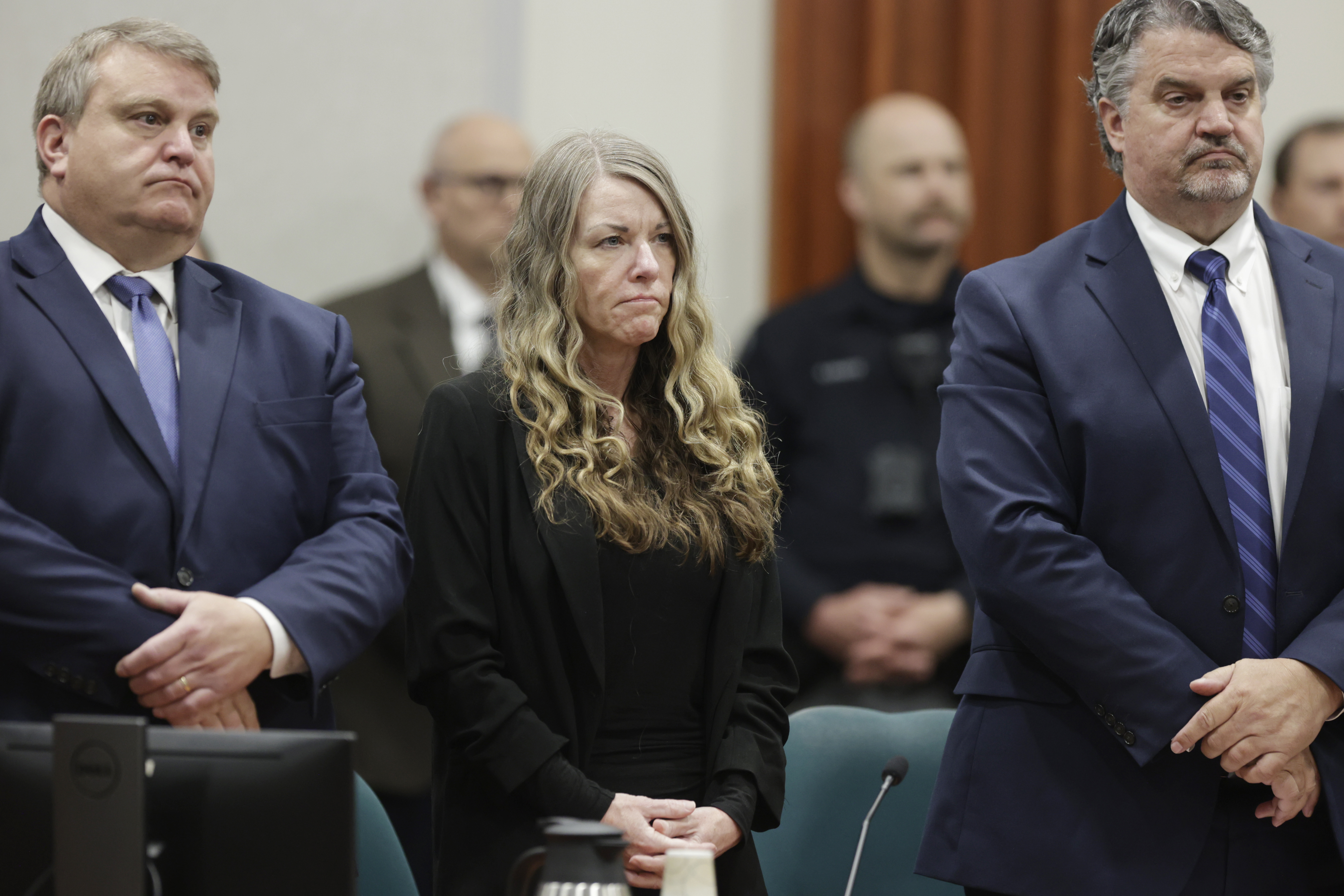 FILE - Lori Vallow Daybell stands and listens as the jury's verdict is read at the Ada County Courthouse in Boise, Idaho, May 12, 2023. (AP Photo/Kyle Green, File)