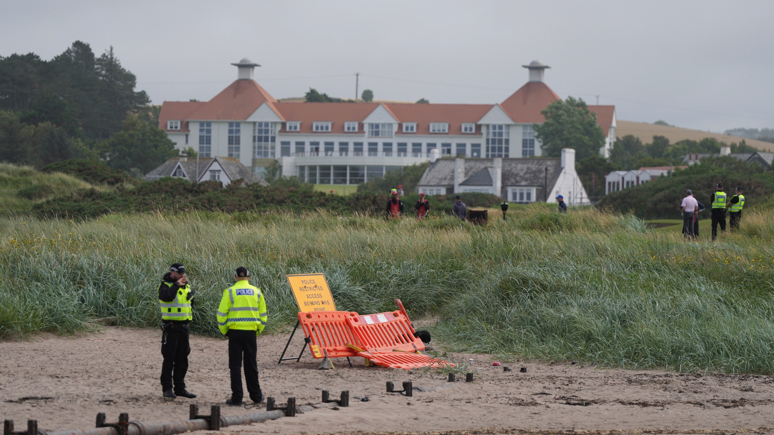 Police guard the Trump Turnberry golf course in Turnberry, Scotland, Friday, July 25, 2025, ahead of President Trump's visit Scotland. (AP Photo/Alastair Grant)