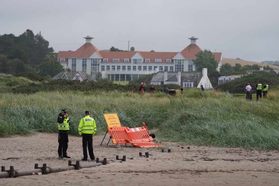 Police guard the Trump Turnberry golf course in Turnberry, Scotland, Friday, July 25, 2025, ahead of President Trump's visit Scotland. (AP Photo/Alastair Grant)