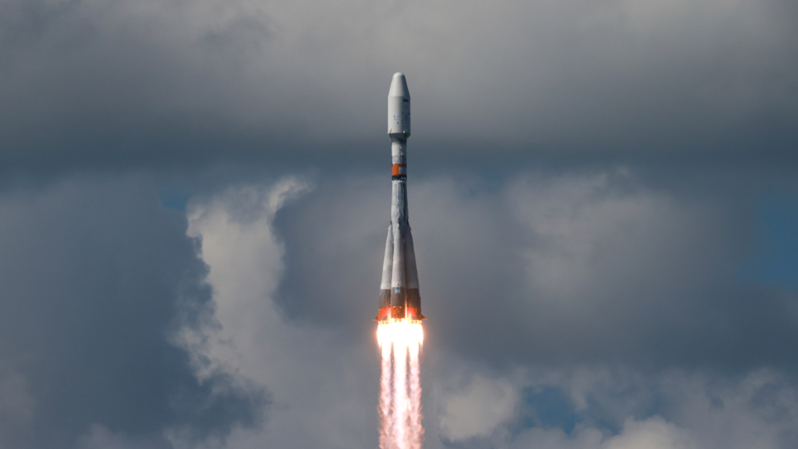 In this photo released by Roscosmos State Space Corporate on Friday, July 25, 2025, a Soyuz rocket lifts off from a launch site in Vostochny in far eastern Russia carrying an Iranian satellite along with Russian satellites into orbit. (Roscosmos State Space Corporate via AP)