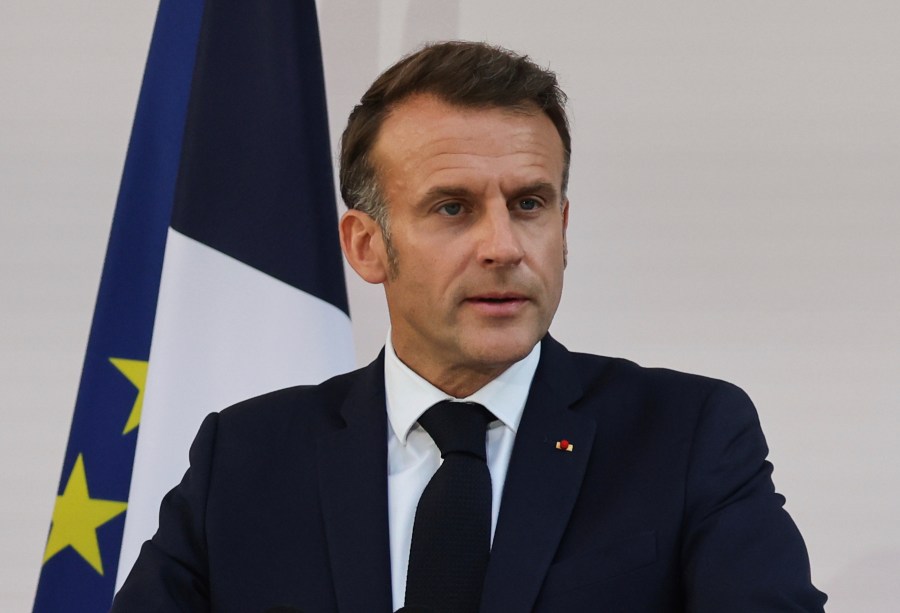 French President Emmanuel Macron speaks to the army leaders at the Hotel le Brienne, Sunday, July 13, 2025, ahead of the Bastille Day parade in Paris. (Ludovic Marin, Pool Photo via AP)