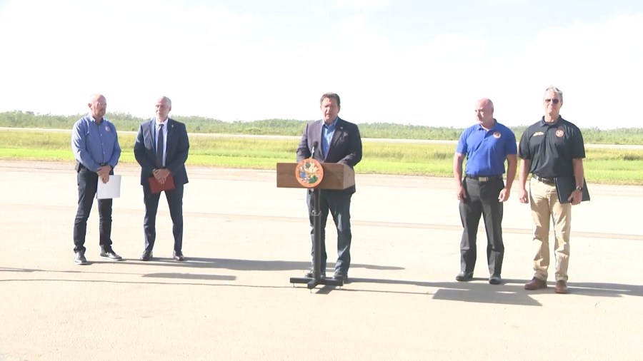 This image from a video feed shows Gov. Ron DeSantis speaking about deportation flights from the remote Everglades immigration lockup known as ”Alligator Alcatraz″ on July 25, 2025 in Ochopee, Florida. (Office Of Florida Governor Ron Desantis via AP)