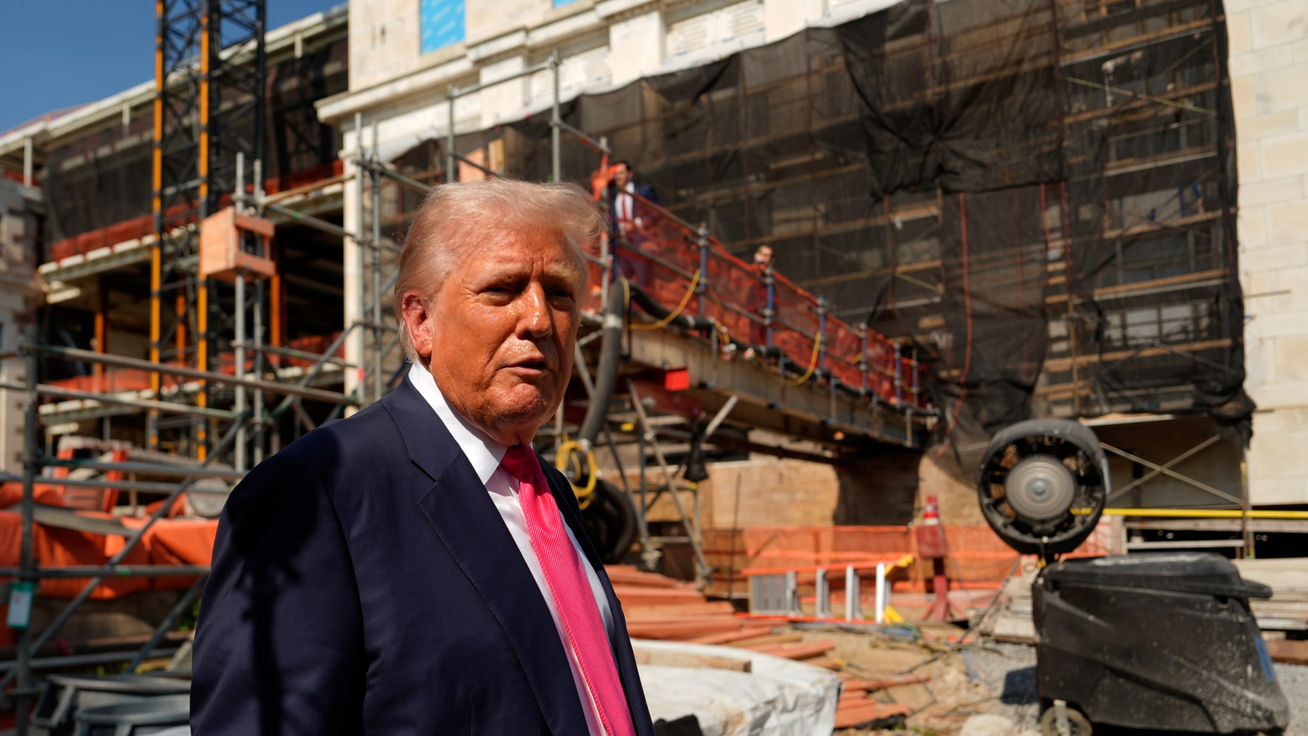 President Donald Trump departs following a visit to the Federal Reserve, Thursday, July 24, 2025, in Washington. (AP Photo/Julia Demaree Nikhinson)