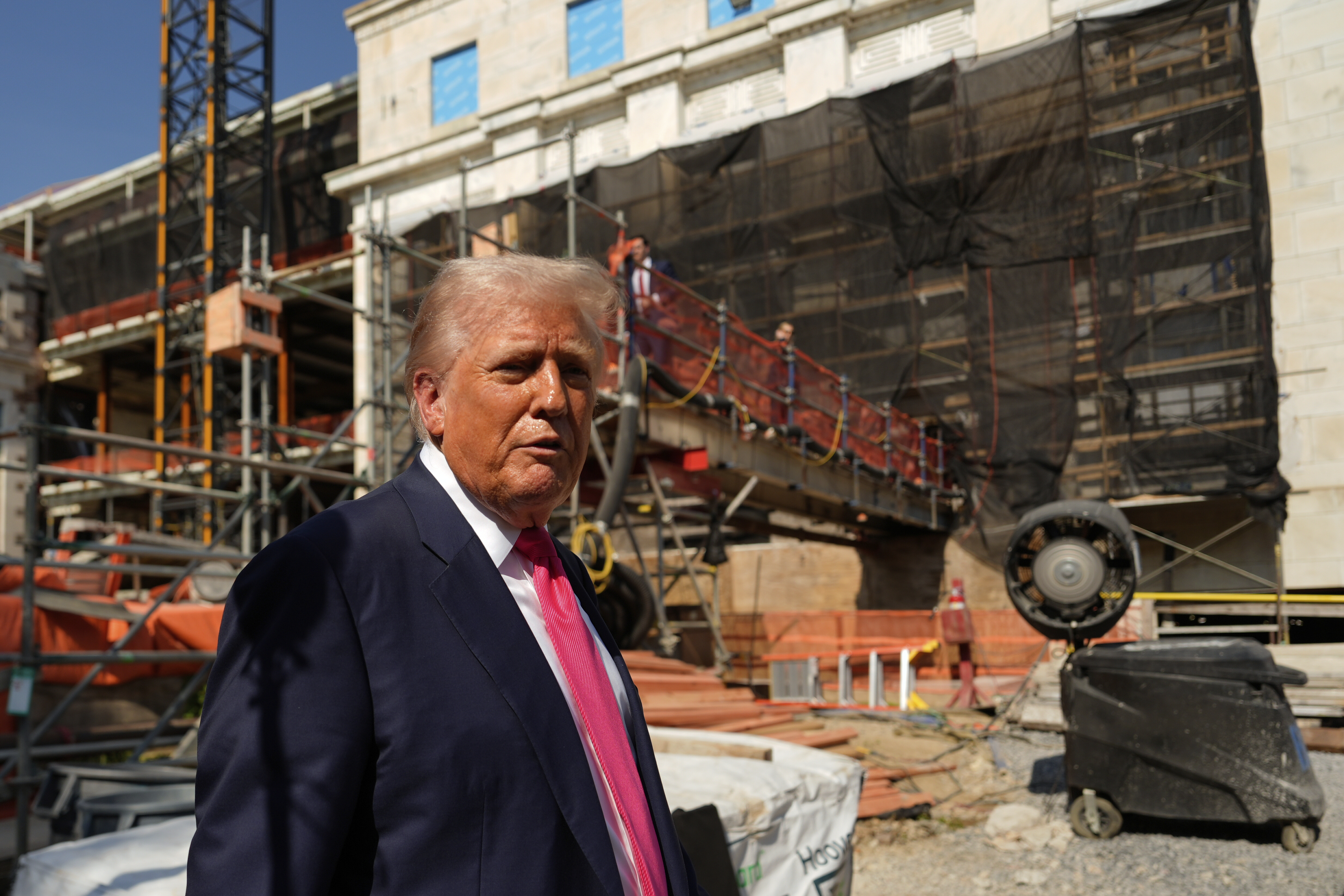 President Donald Trump departs following a visit to the Federal Reserve, Thursday, July 24, 2025, in Washington. (AP Photo/Julia Demaree Nikhinson)