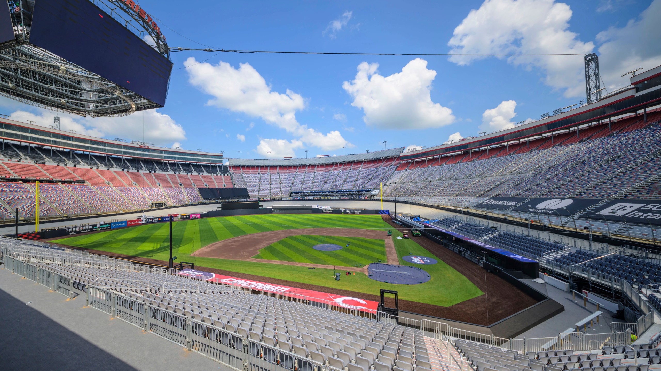 Work continues on the baseball field inside the racetrack at Bristol Motor Speedway, Friday, July 25, 2025, in Bristol, Tenn., for MLB Speedway Classic baseball game between the Cincinnati Reds and Atlanta Braves on Aug. 2. (Earl Neikirk/Bristol Motor Speedway via AP