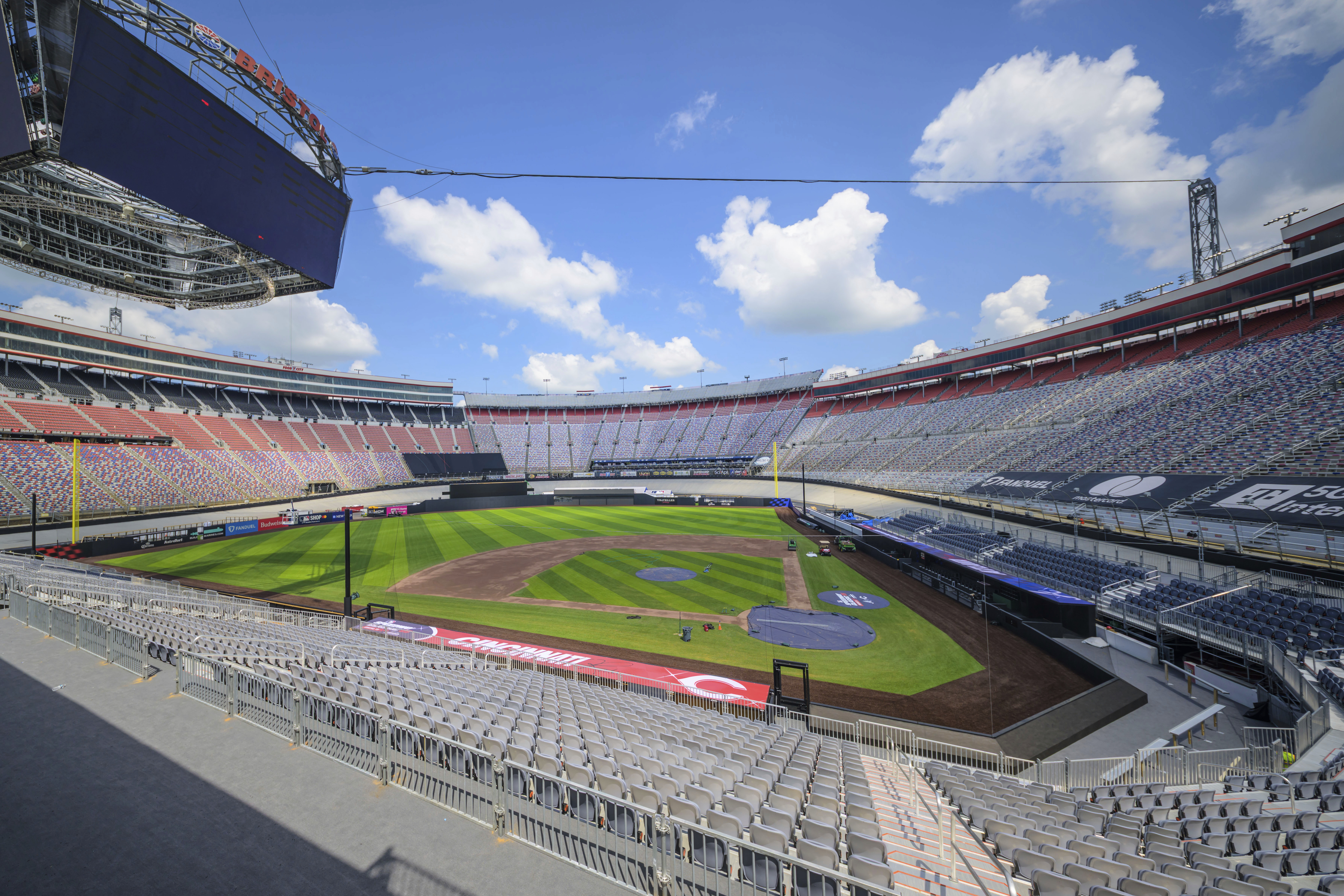 Work continues on the baseball field inside the racetrack at Bristol Motor Speedway, Friday, July 25, 2025, in Bristol, Tenn., for MLB Speedway Classic baseball game between the Cincinnati Reds and Atlanta Braves on Aug. 2. (Earl Neikirk/Bristol Motor Speedway via AP