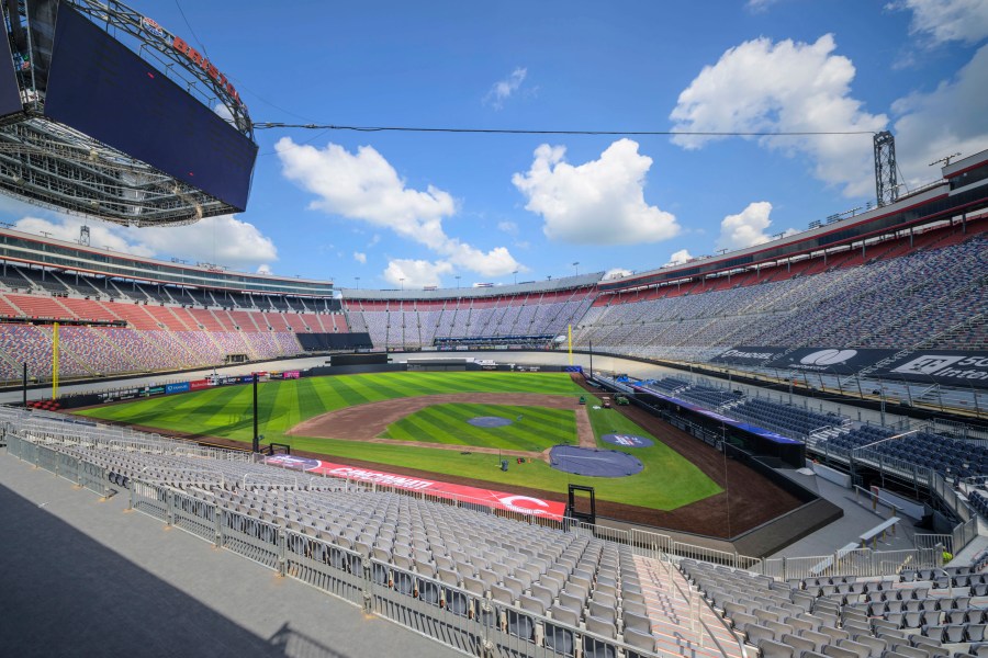 Work continues on the baseball field inside the racetrack at Bristol Motor Speedway, Friday, July 25, 2025, in Bristol, Tenn., for MLB Speedway Classic baseball game between the Cincinnati Reds and Atlanta Braves on Aug. 2. (Earl Neikirk/Bristol Motor Speedway via AP