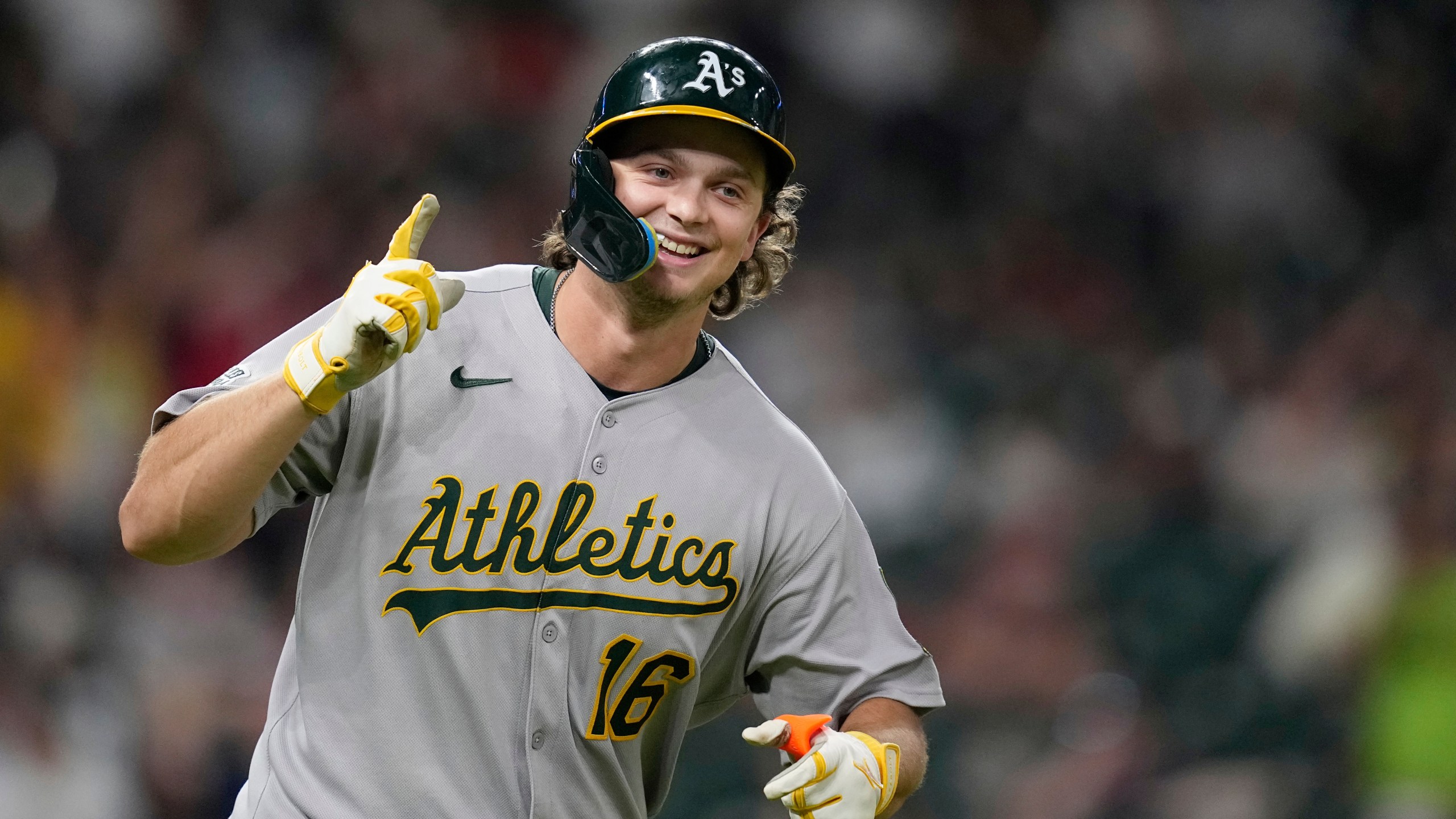 Athletics' Nick Kurtz celebrates after hitting a three-run home against the Houston Astros during the ninth inning of a baseball game Friday, July 25, 2025, in Houston. (AP Photo/David J. Phillip)