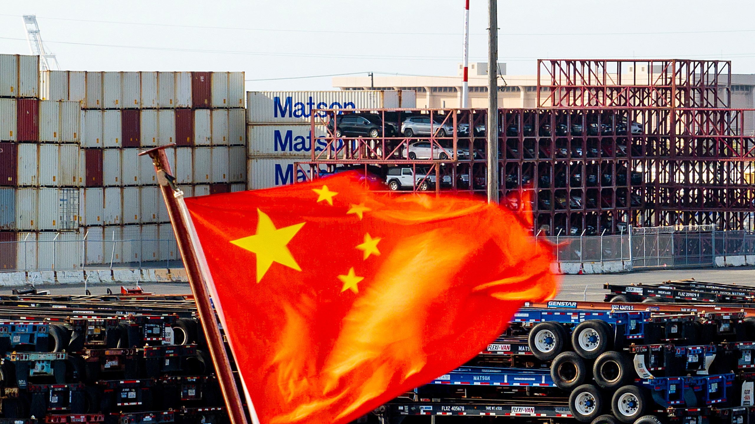 FILE - A Chinese flag flies from a ship at the Port of Oakland on Tuesday, April 15, 2025, in Oakland, Calif. (AP Photo/Noah Berger,File)