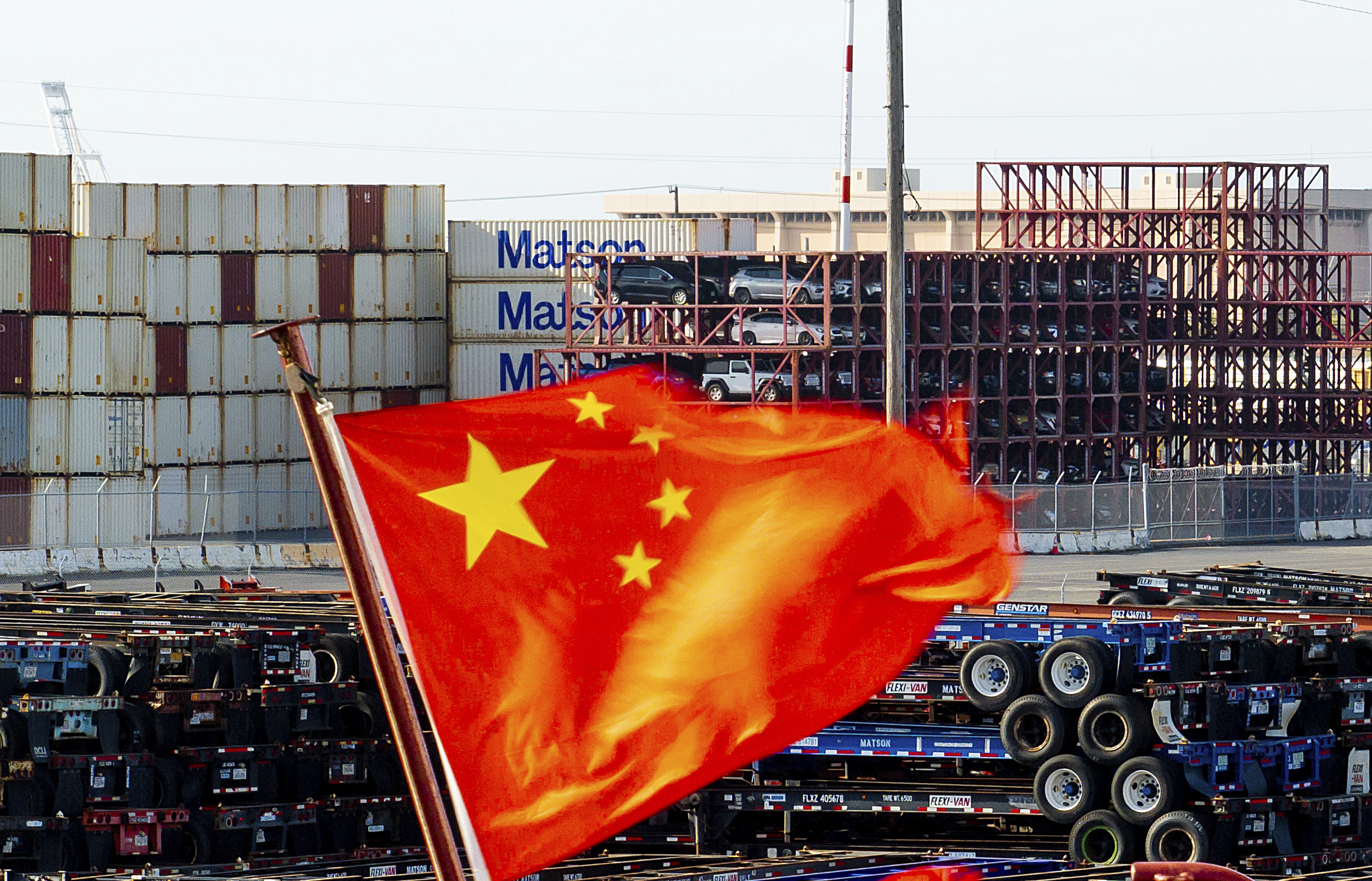 FILE - A Chinese flag flies from a ship at the Port of Oakland on Tuesday, April 15, 2025, in Oakland, Calif. (AP Photo/Noah Berger,File)