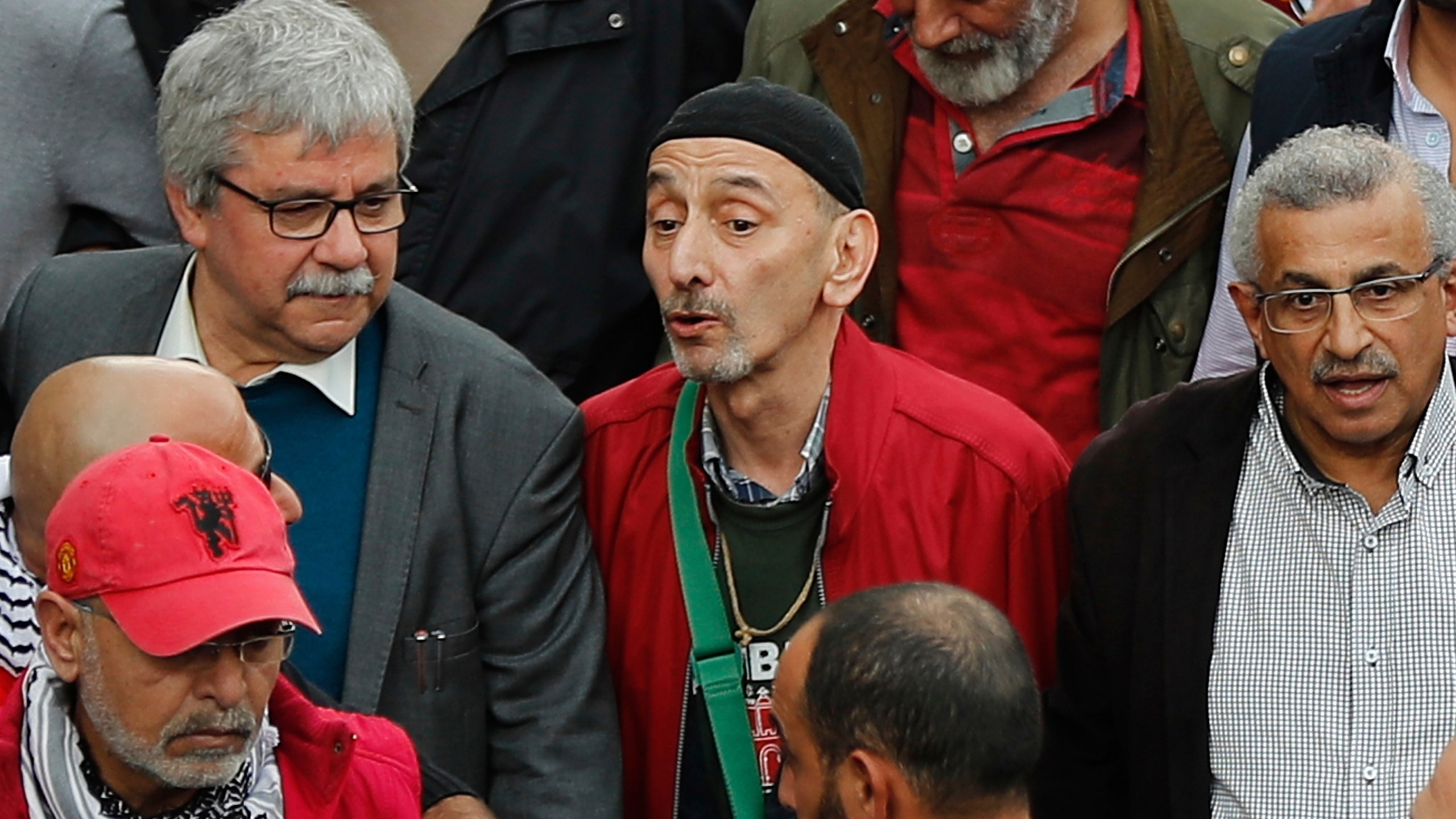 Ziad Rahbani, centre, a visionary Lebanese composer, playwright and pianist, during an anti-government protest organized by the country's communist party, in Beirut, Lebanon, Sunday, Dec. 16, 2018. (AP Photo/Hussein Malla)