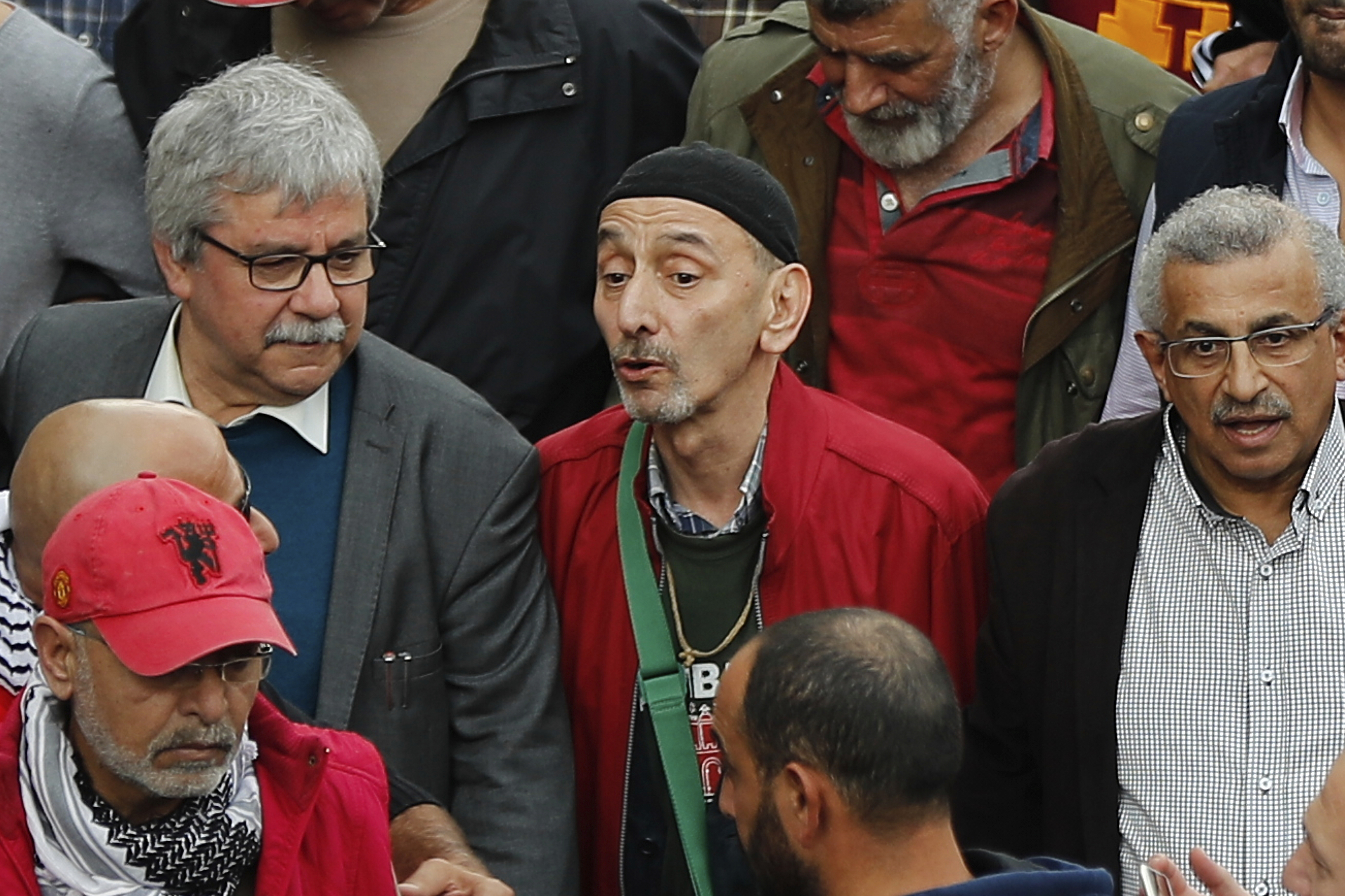 Ziad Rahbani, centre, a visionary Lebanese composer, playwright and pianist, during an anti-government protest organized by the country's communist party, in Beirut, Lebanon, Sunday, Dec. 16, 2018. (AP Photo/Hussein Malla)