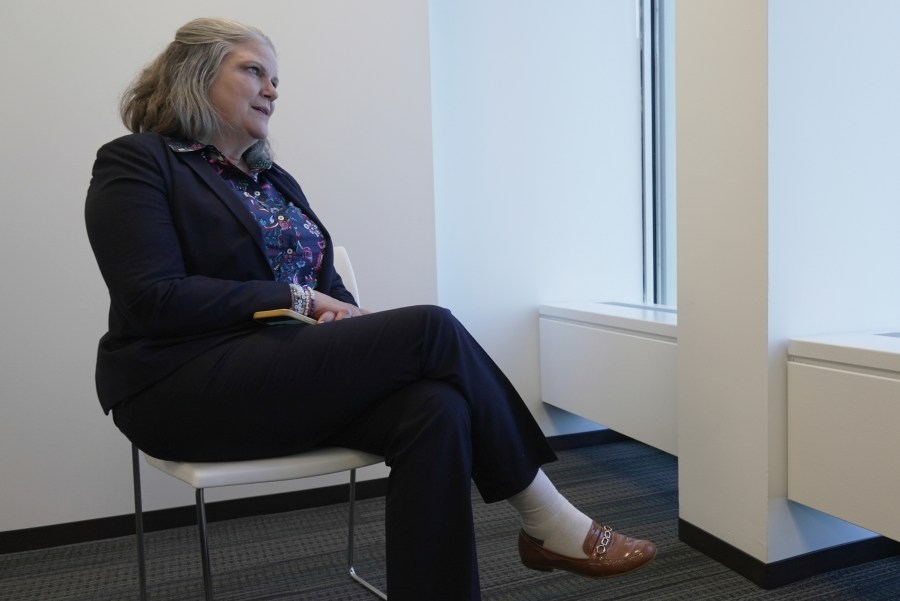 Jennifer Peyton sits for an interview in downtown Chicago on July 21, 2025. (AP Photo/Laura Bargfeld)