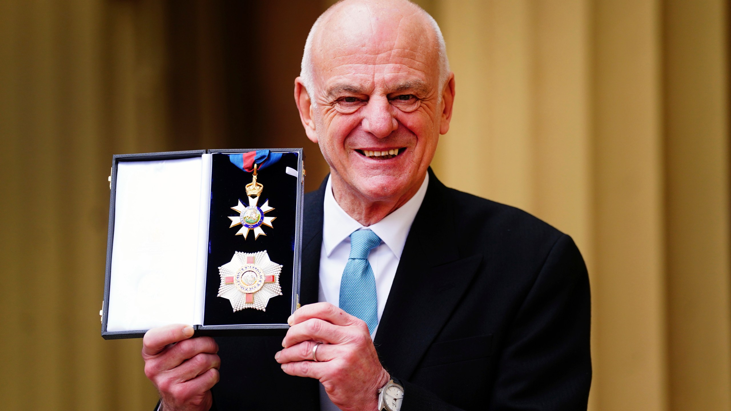 FILE - David Nabarro, World Health Organisation Special Envoy for Covid-19 Prevention and Response, poses after he was made a Knight Commander of the Order of St Michael and St George during an investiture ceremony at Buckingham Palace in London, Friday March 3, 2023. (Victoria Jones/Pool via AP, file)