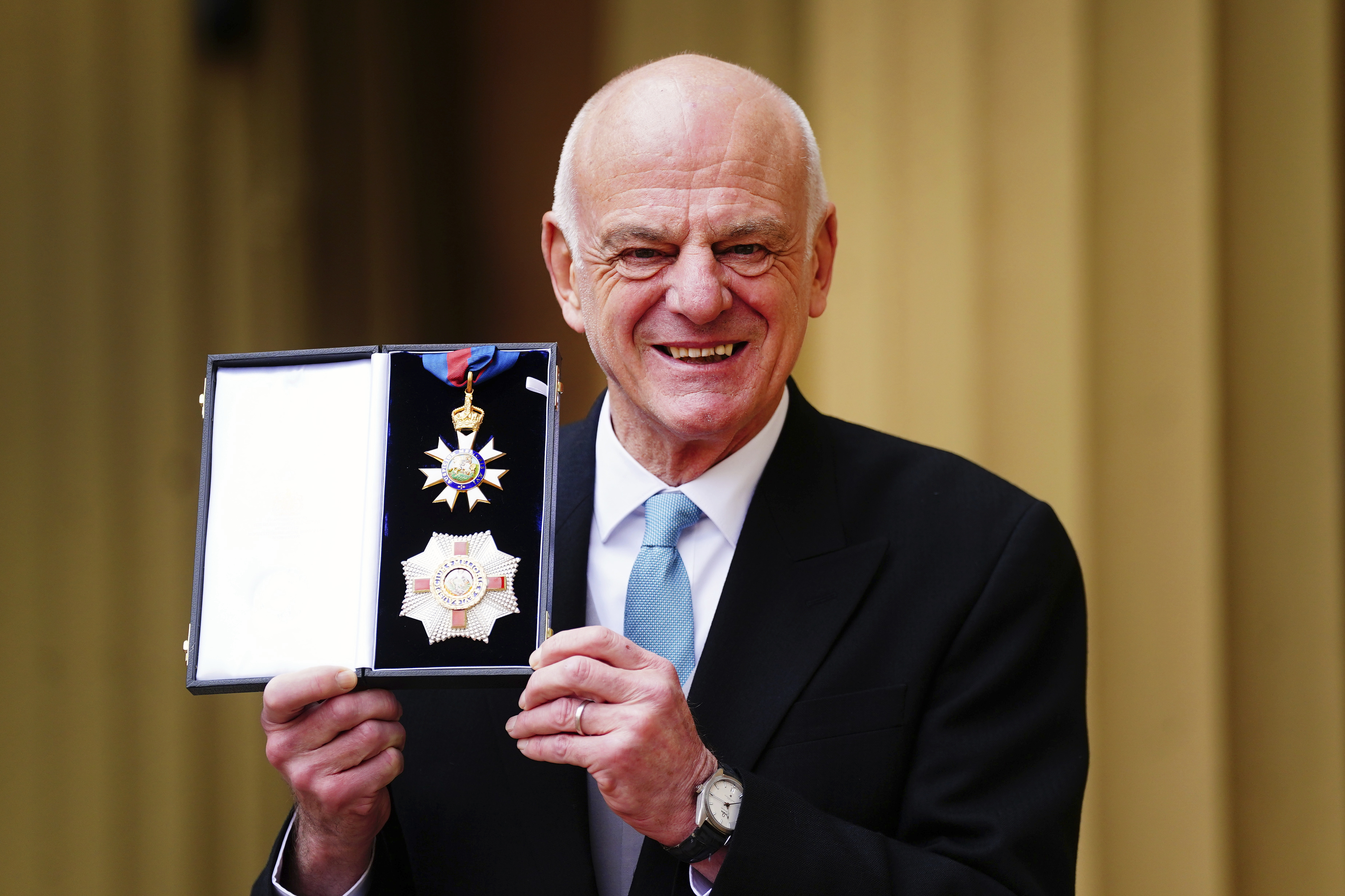 FILE - David Nabarro, World Health Organisation Special Envoy for Covid-19 Prevention and Response, poses after he was made a Knight Commander of the Order of St Michael and St George during an investiture ceremony at Buckingham Palace in London, Friday March 3, 2023. (Victoria Jones/Pool via AP, file)