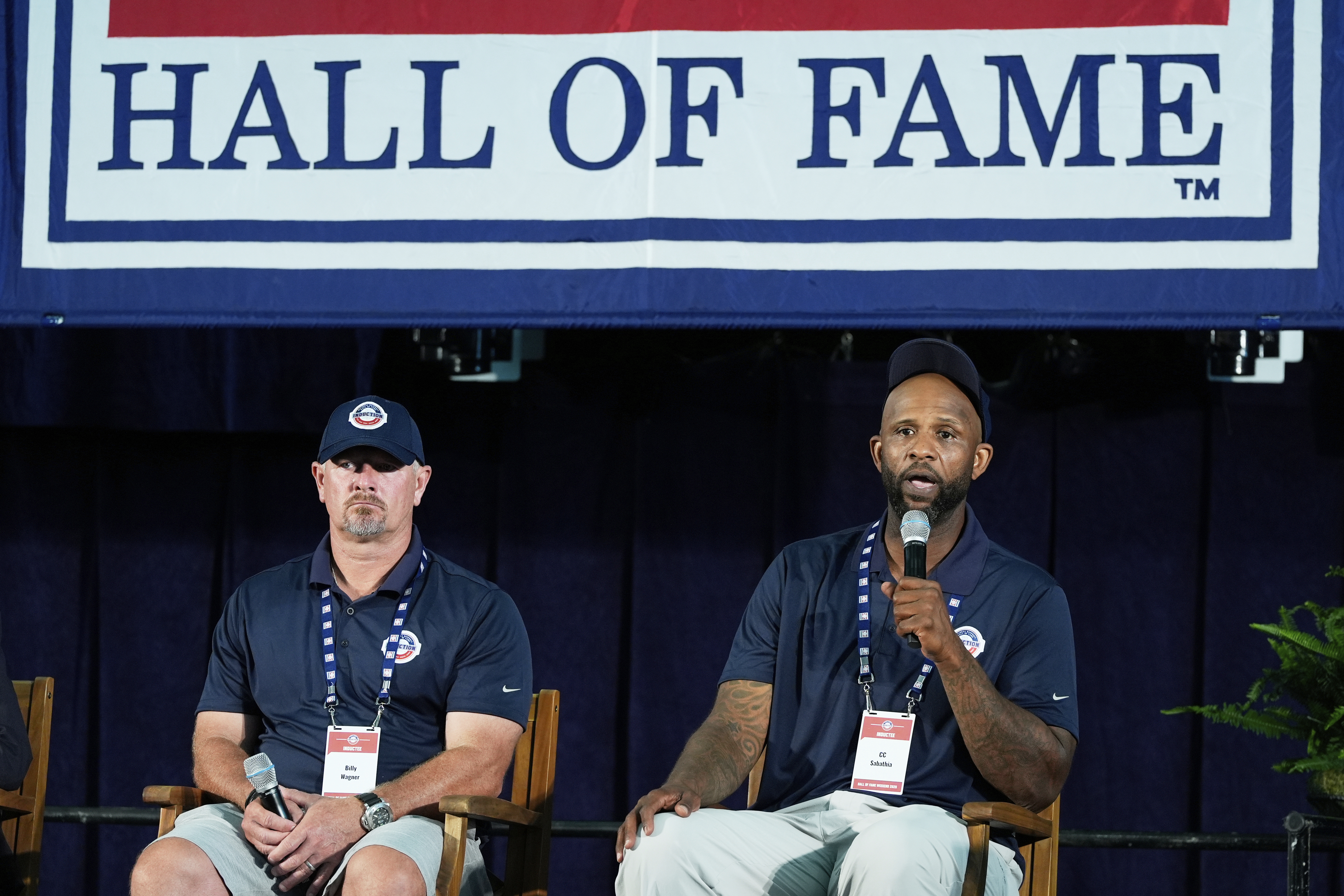 Baseball Hall of Fame inductees Billy Wagner, left, and CC Sabathia speak to reporters during a news conference in Cooperstown, N.Y., Saturday, July 26, 2025. (AP Photo/Seth Wenig)