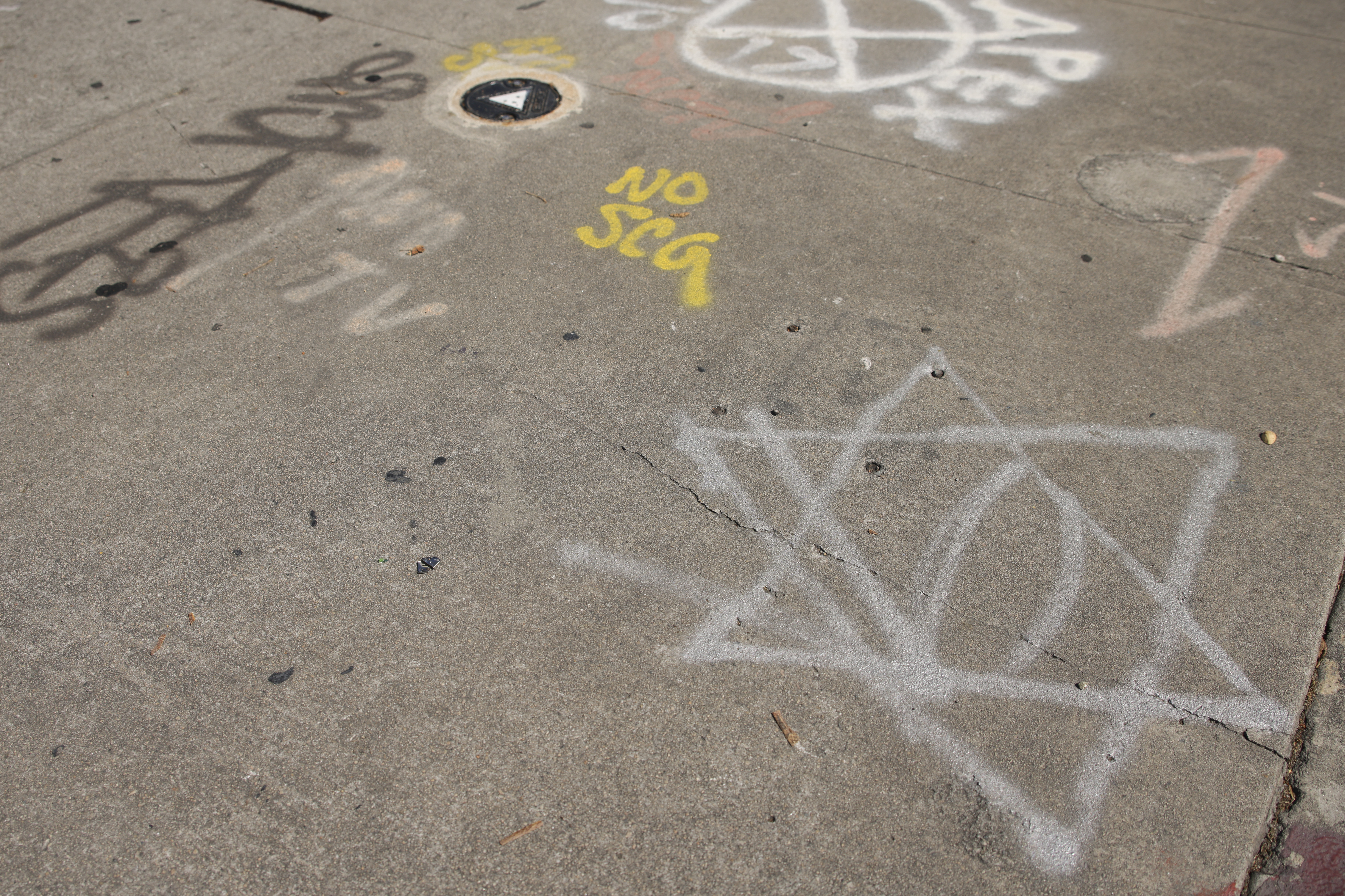 Graffiti is seen on the ground near the Islamic Center of Southern California on June 16, 2025, in Los Angeles. (AP Photo/Jessie Alcheh)