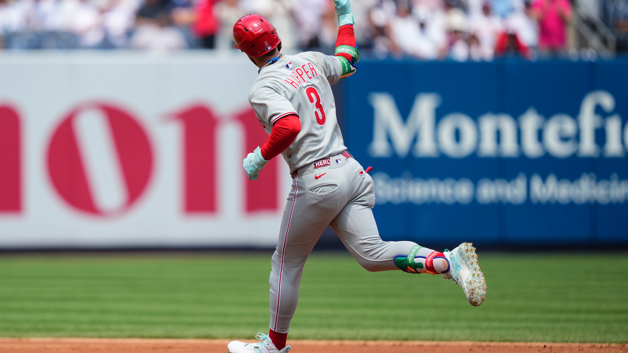 Philadelphia Phillies' Bryce Harper (3) runs the bases after hitting a home run during the third inning of a baseball game against the New York Yankees, Saturday, July 26, 2025, in New York. (AP Photo/Yuki Iwamura)