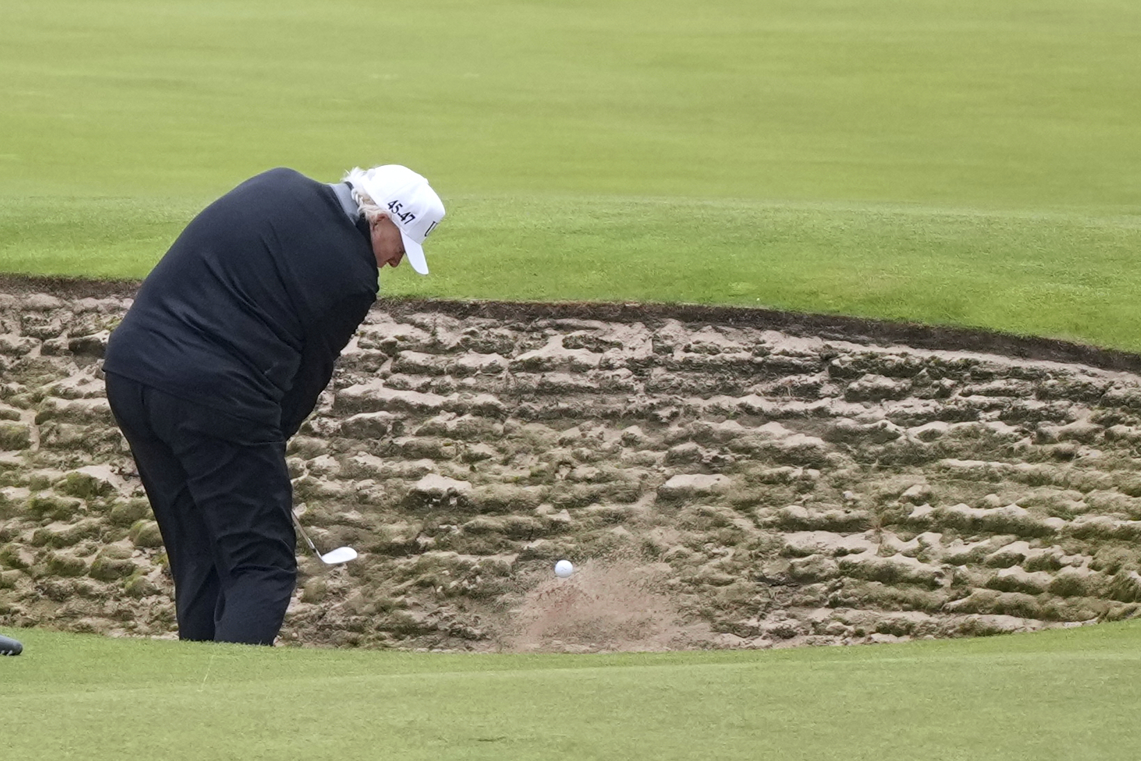 President Donald Trump plays golf at the Trump Turnberry golf course in Turnberry, Scotland, Sunday, July 27, 2025.(AP Photo/Alastair Grant)