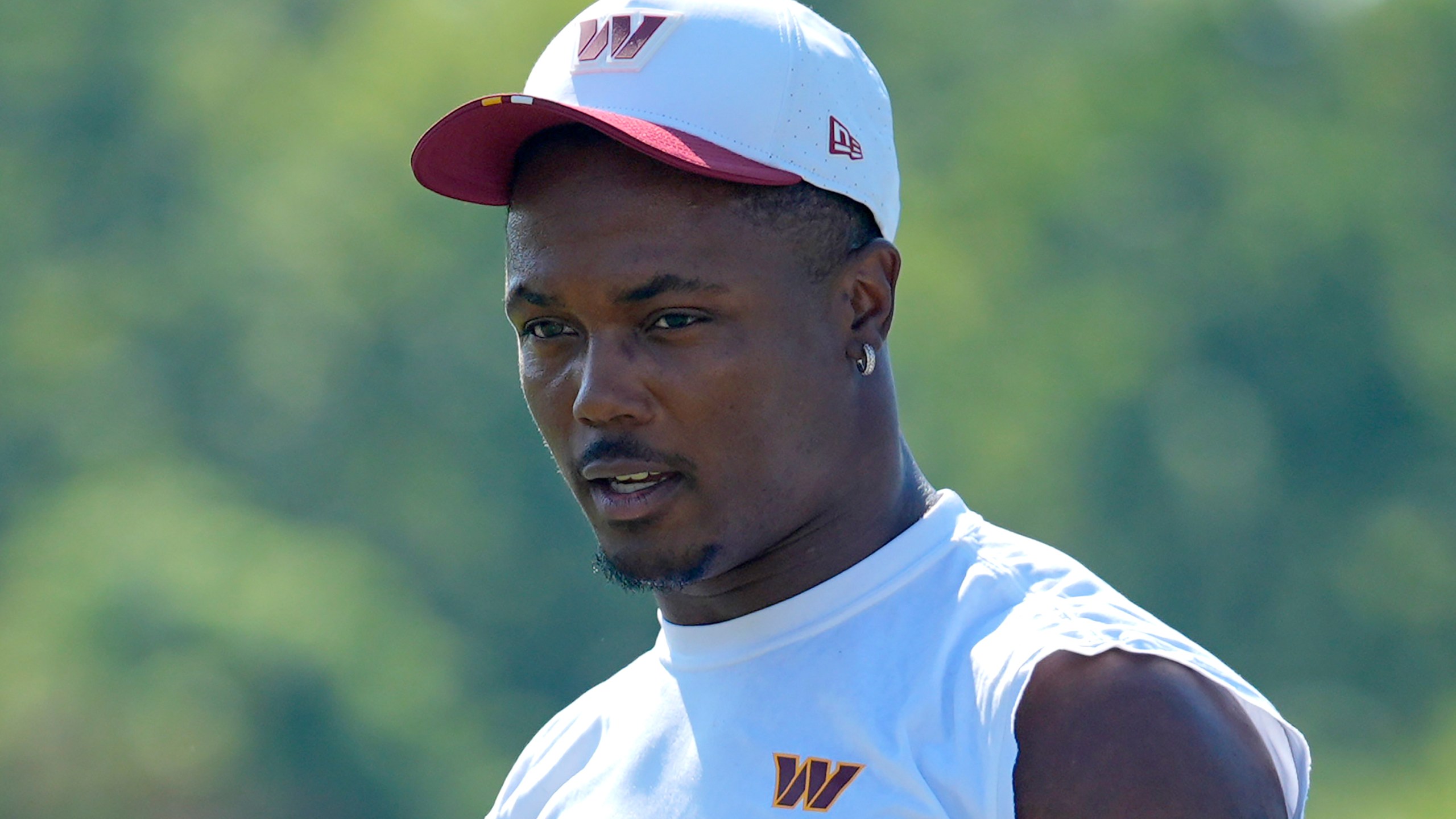 Washington Commanders wide receiver Terry McLaurin walks across the field after a practice at the team's NFL football training camp, Sunday, July 27, 2025, in Ashburn, Va. (AP Photo/Mark Schiefelbein)