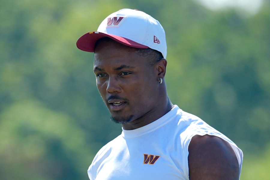 Washington Commanders wide receiver Terry McLaurin walks across the field after a practice at the team's NFL football training camp, Sunday, July 27, 2025, in Ashburn, Va. (AP Photo/Mark Schiefelbein)