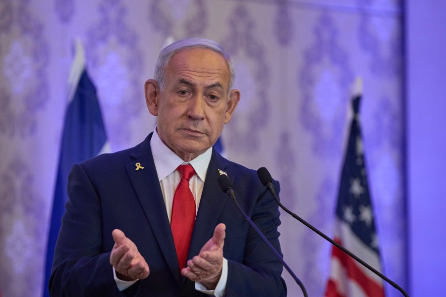 Israeli Prime Minister Benjamin Netanyahu speaks to the audience at a conference in Jerusalem, Sunday, July 27, 2025. (AP Photo/Ohad Zwigenberg)