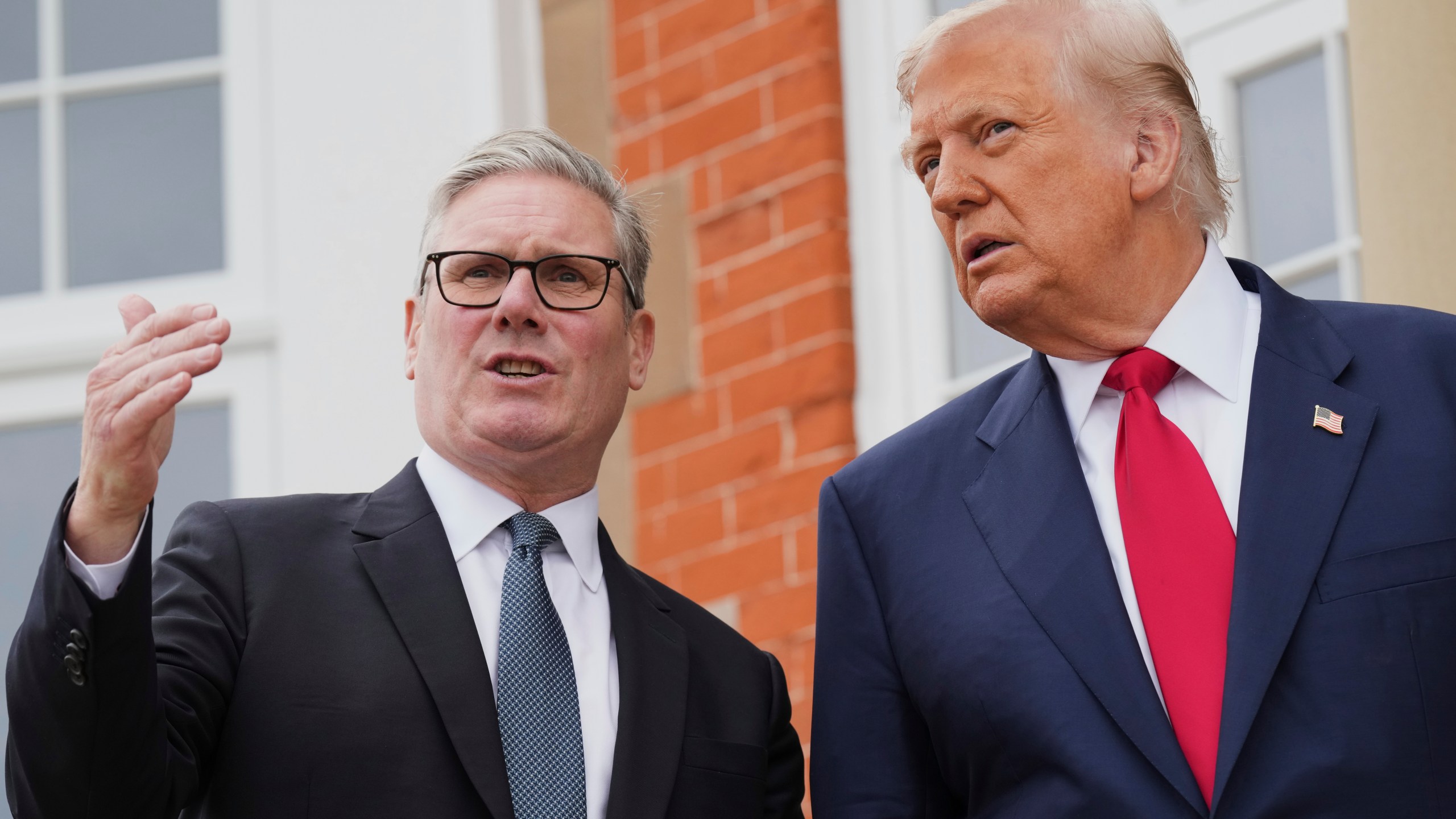 President Donald Trump, right, speaks with Britain's Prime Minister Keir Starmer during an official greeting at the Trump Turnberry golf course in Turnberry, Scotland Monday, July 28, 2025. (AP Photo/Jacquelyn Martin)
