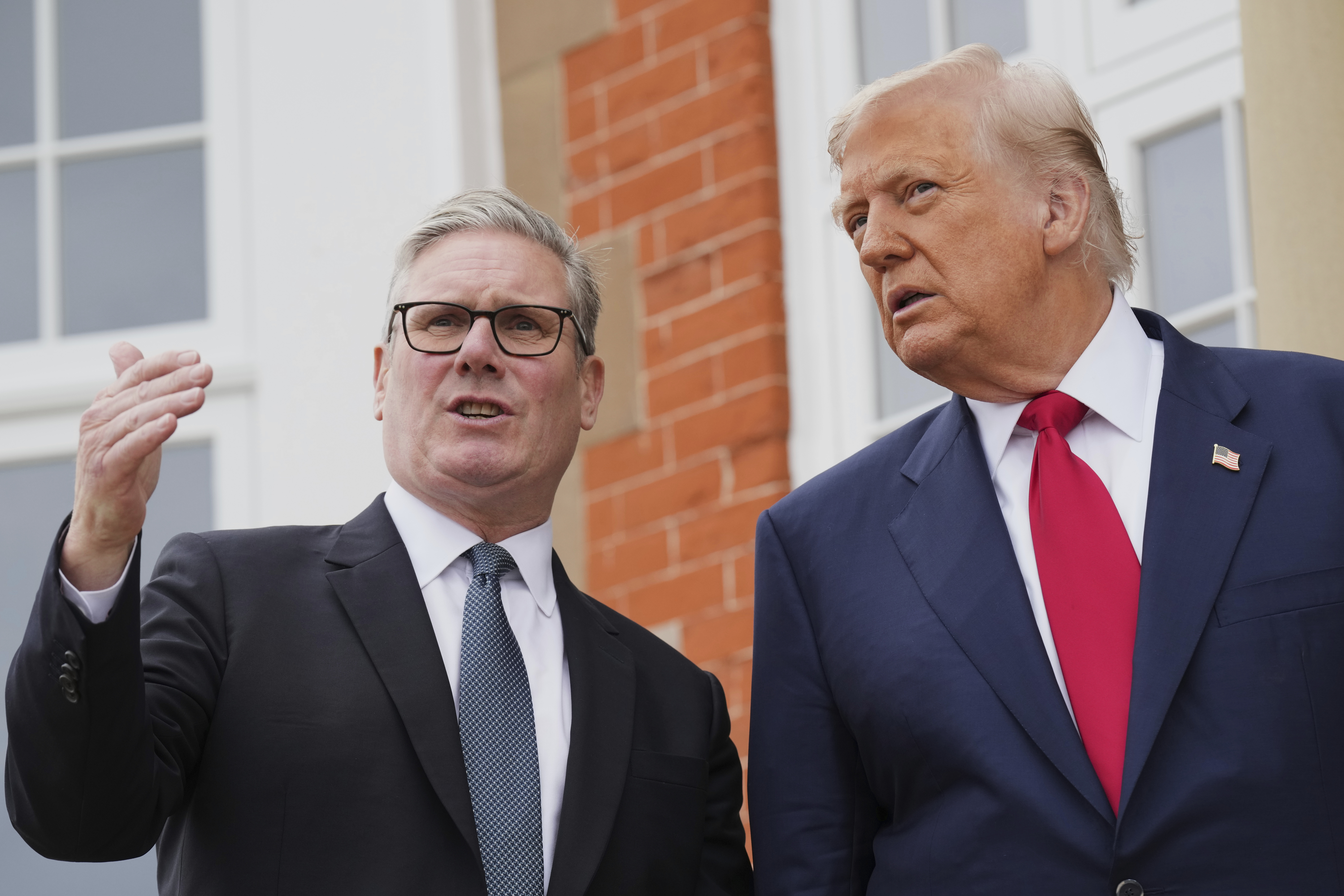 President Donald Trump, right, speaks with Britain's Prime Minister Keir Starmer during an official greeting at the Trump Turnberry golf course in Turnberry, Scotland Monday, July 28, 2025. (AP Photo/Jacquelyn Martin)