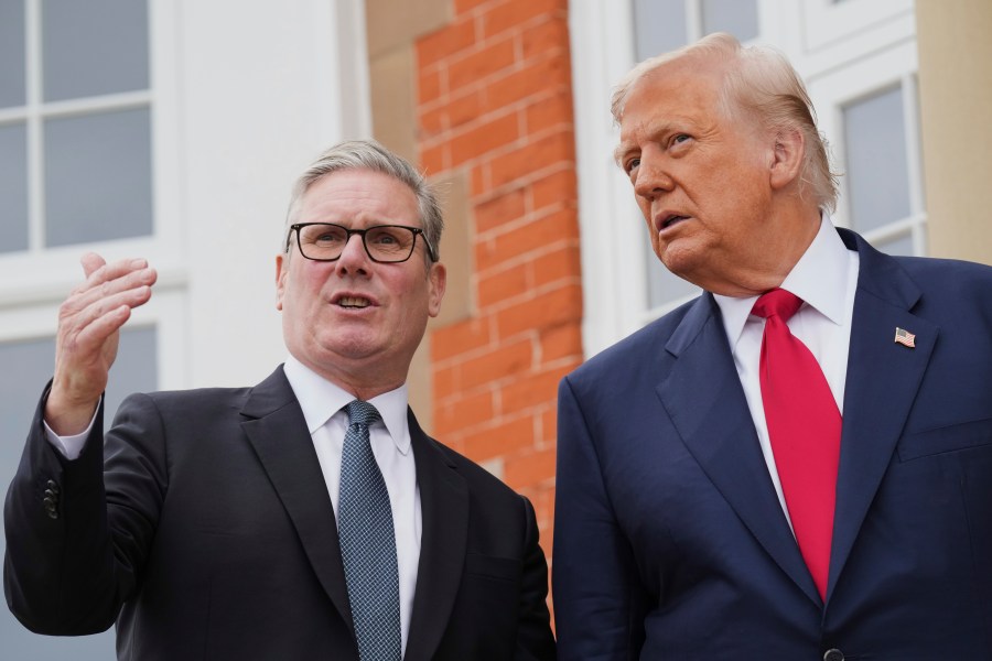 President Donald Trump, right, speaks with Britain's Prime Minister Keir Starmer during an official greeting at the Trump Turnberry golf course in Turnberry, Scotland Monday, July 28, 2025. (AP Photo/Jacquelyn Martin)