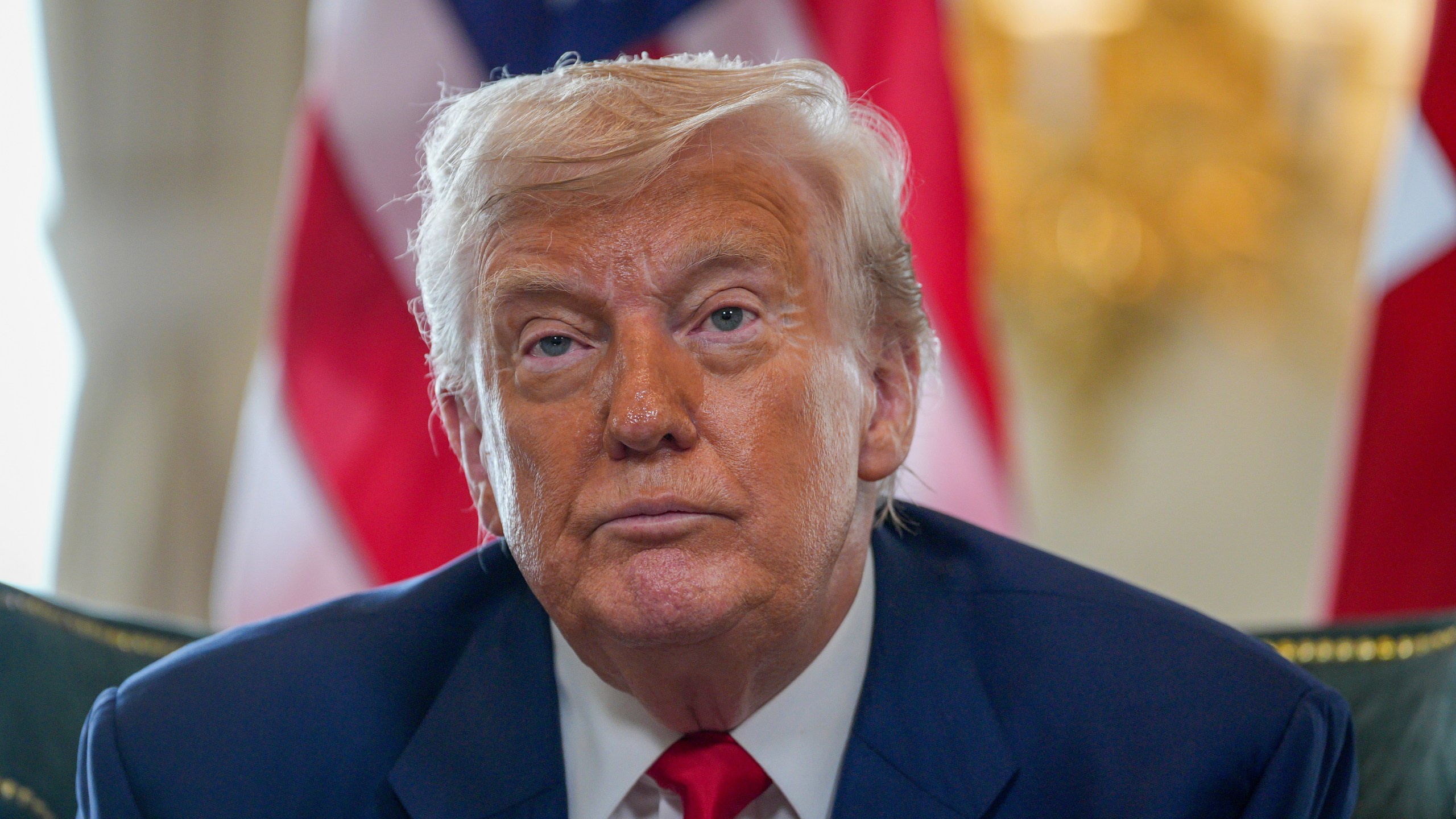 U.S. President Donald Trump talks to the media as he meets with British Prime Minister Keir Starmer at Trump Turnberry golf club in Turnberry, Scotland, Monday, July 28, 2025. (Christopher Furlong/Pool Photo via AP)