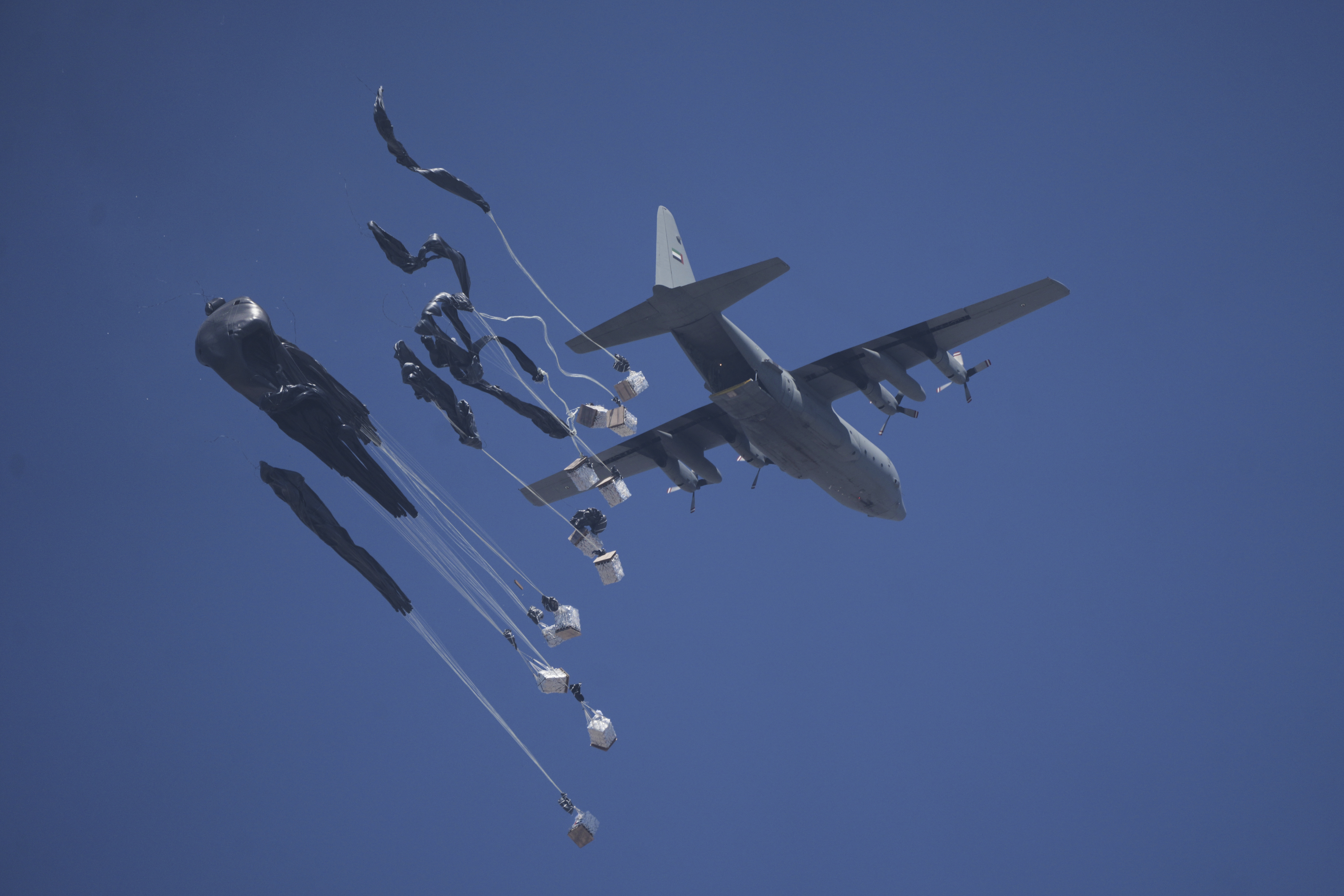 Humanitarian aid is airdropped to Palestinians over Gaza City, Gaza Strip, Sunday, July 27, 2025. (AP Photo/Jehad Alshrafi)