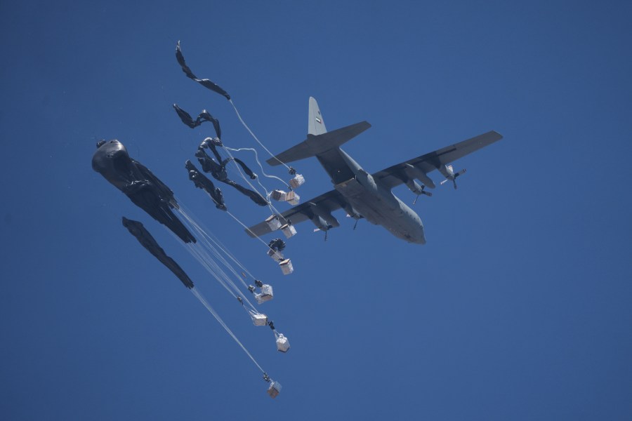 Humanitarian aid is airdropped to Palestinians over Gaza City, Gaza Strip, Sunday, July 27, 2025. (AP Photo/Jehad Alshrafi)