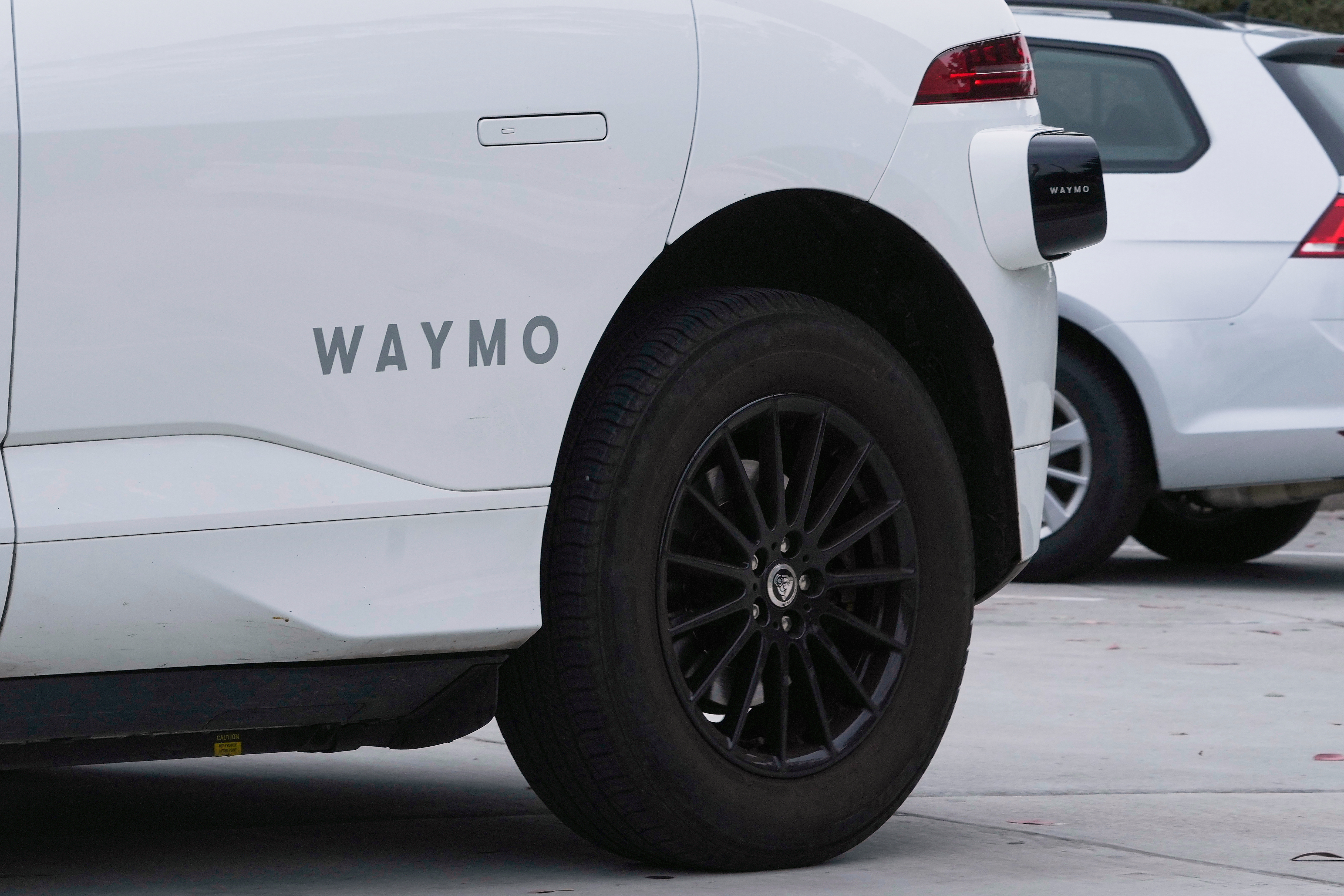 FILE - A Waymo vehicle drives in San Francisco, Thursday, July 3, 2025. (AP Photo/Jeff Chiu, File)
