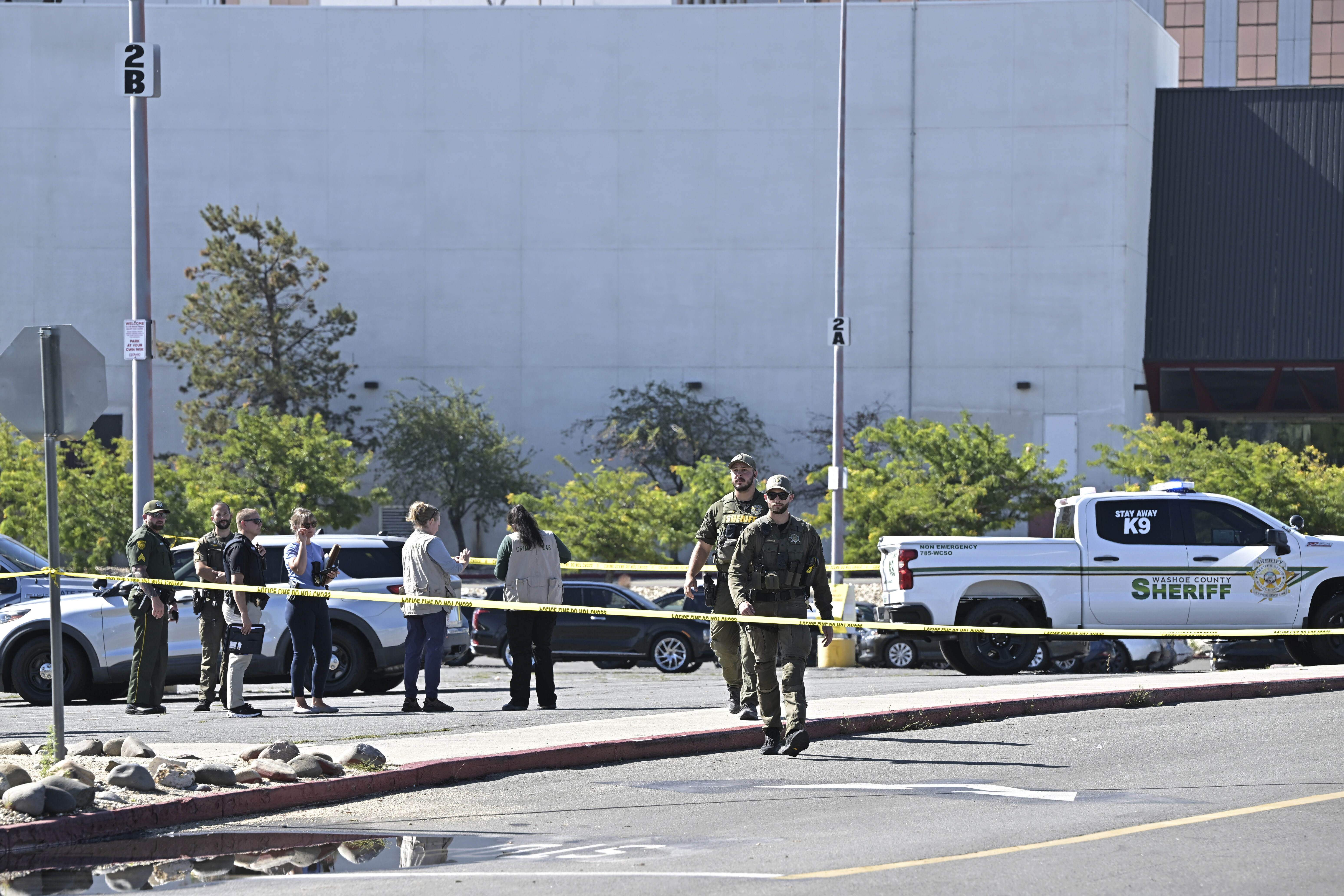 Police respond to a shooting outside the Grand Sierra Resort in Reno, Nev., Monday, July 28, 2025. (AP Photo/Andy Barron)