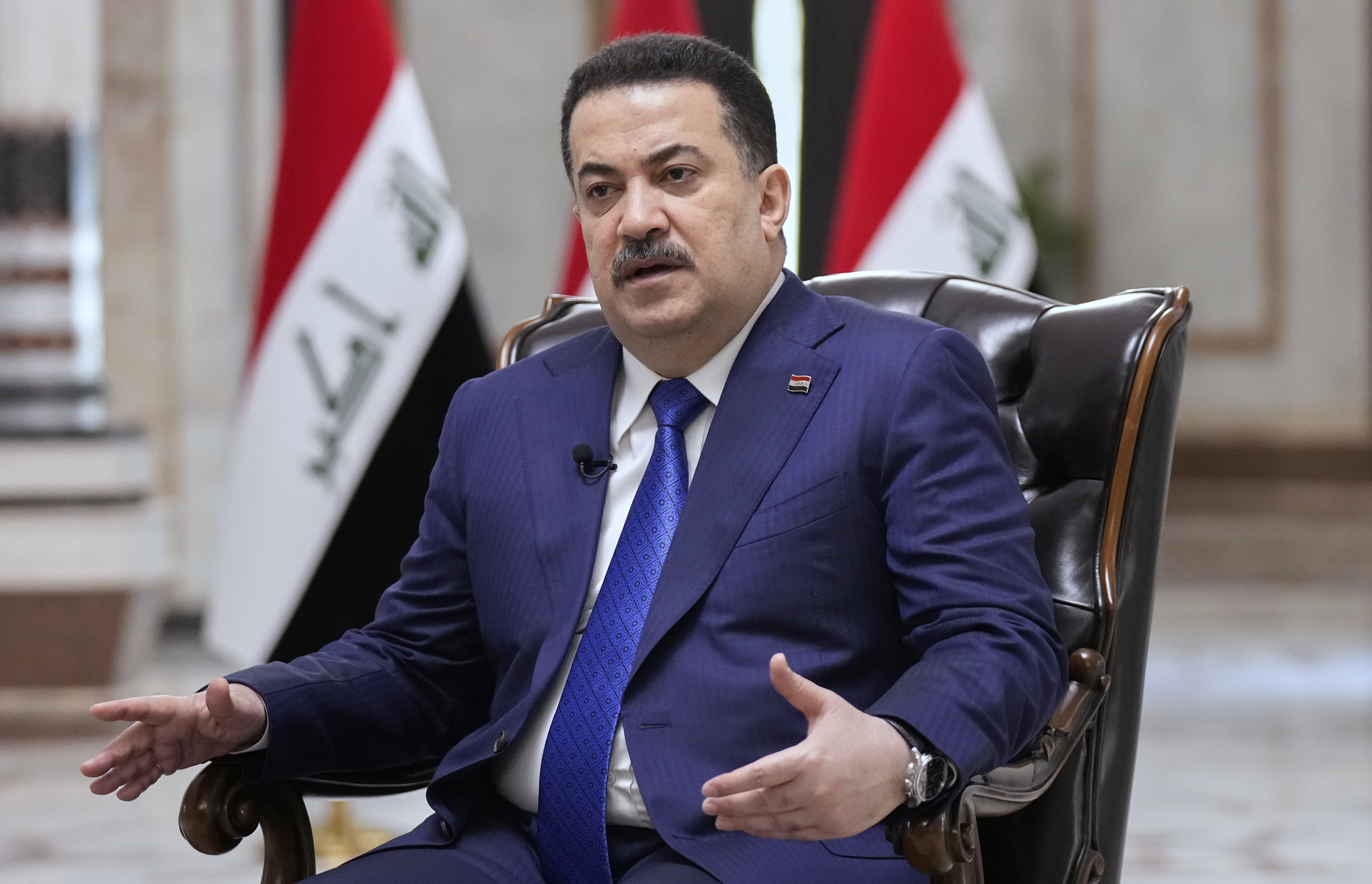 Iraq's Prime Minister Mohammed al-Sudani speaks during an interview with The Associated Press in Baghdad on Monday, July 28, 2025. (AP Photo/Hadi Mizban)