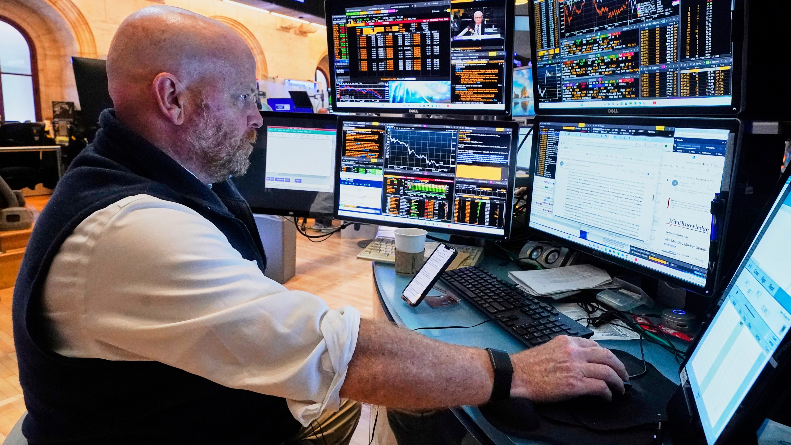 Trader Steven Gohl works on the floor of the New York Stock Exchange, Monday, July 21, 2025. (AP Photo/Richard Drew)