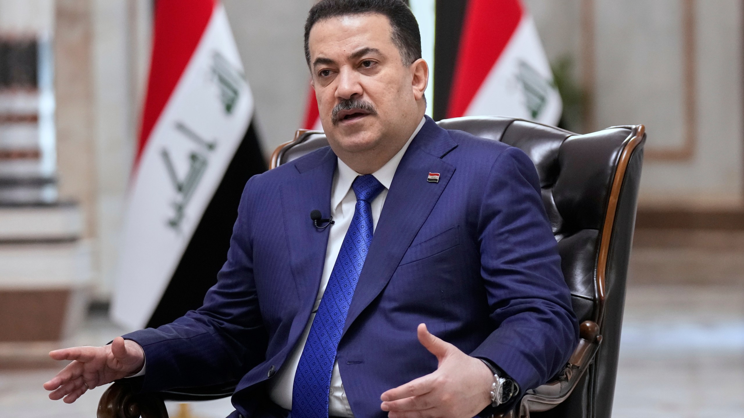 Iraq's Prime Minister Mohammed al-Sudani speaks during an interview with The Associated Press in Baghdad on Monday, July 28, 2025. (AP Photo/Hadi Mizban)