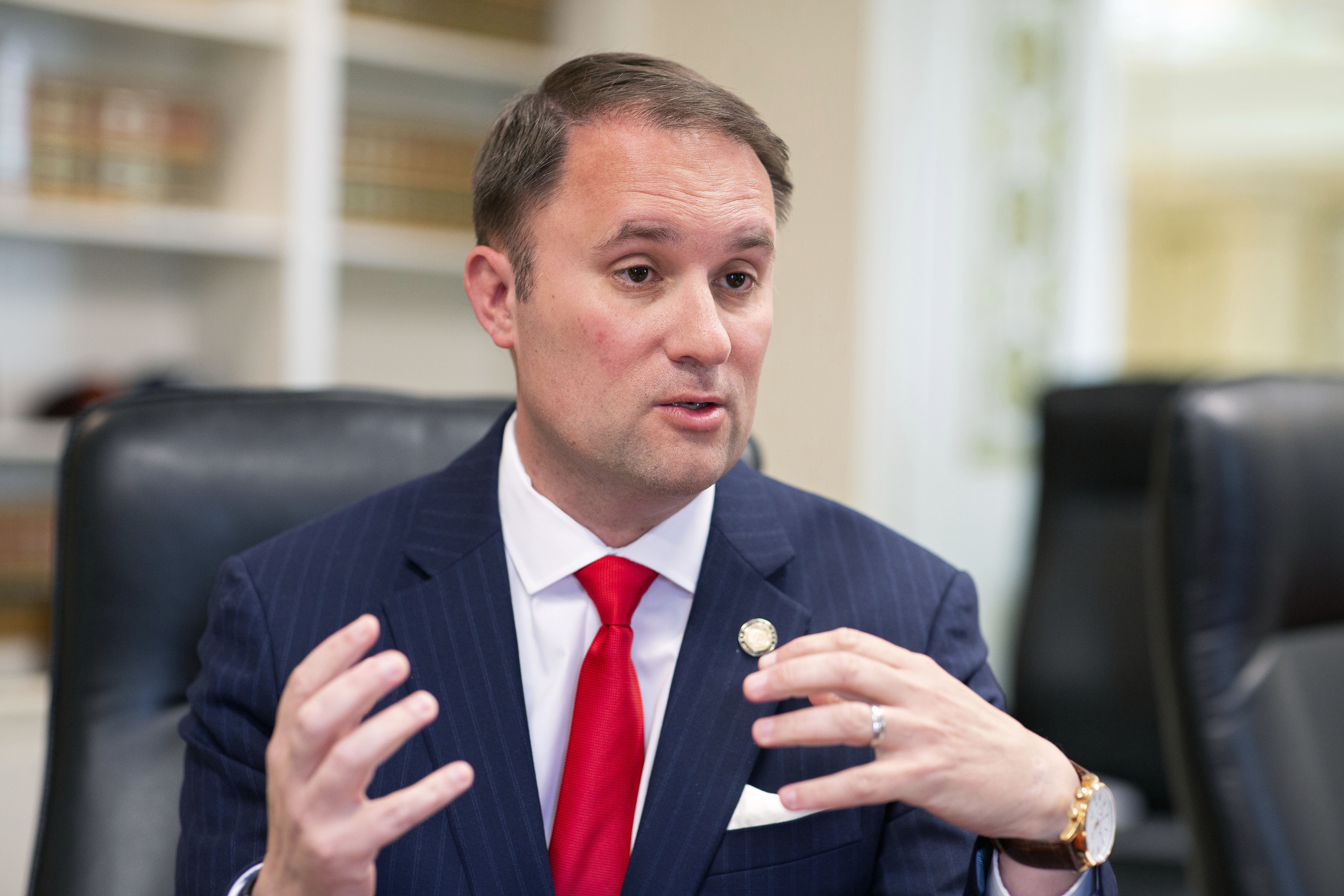 FILE - Virginia Attorney General Jason Miyares speaks during an interview at the Office of the Attorney General in Richmond, Va., Tuesday, May 9, 2023. (AP Photo/Ryan M. Kelly, file)