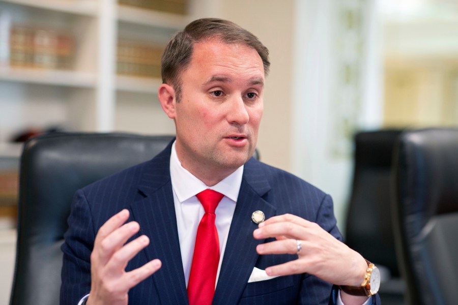 FILE - Virginia Attorney General Jason Miyares speaks during an interview at the Office of the Attorney General in Richmond, Va., Tuesday, May 9, 2023. (AP Photo/Ryan M. Kelly, file)