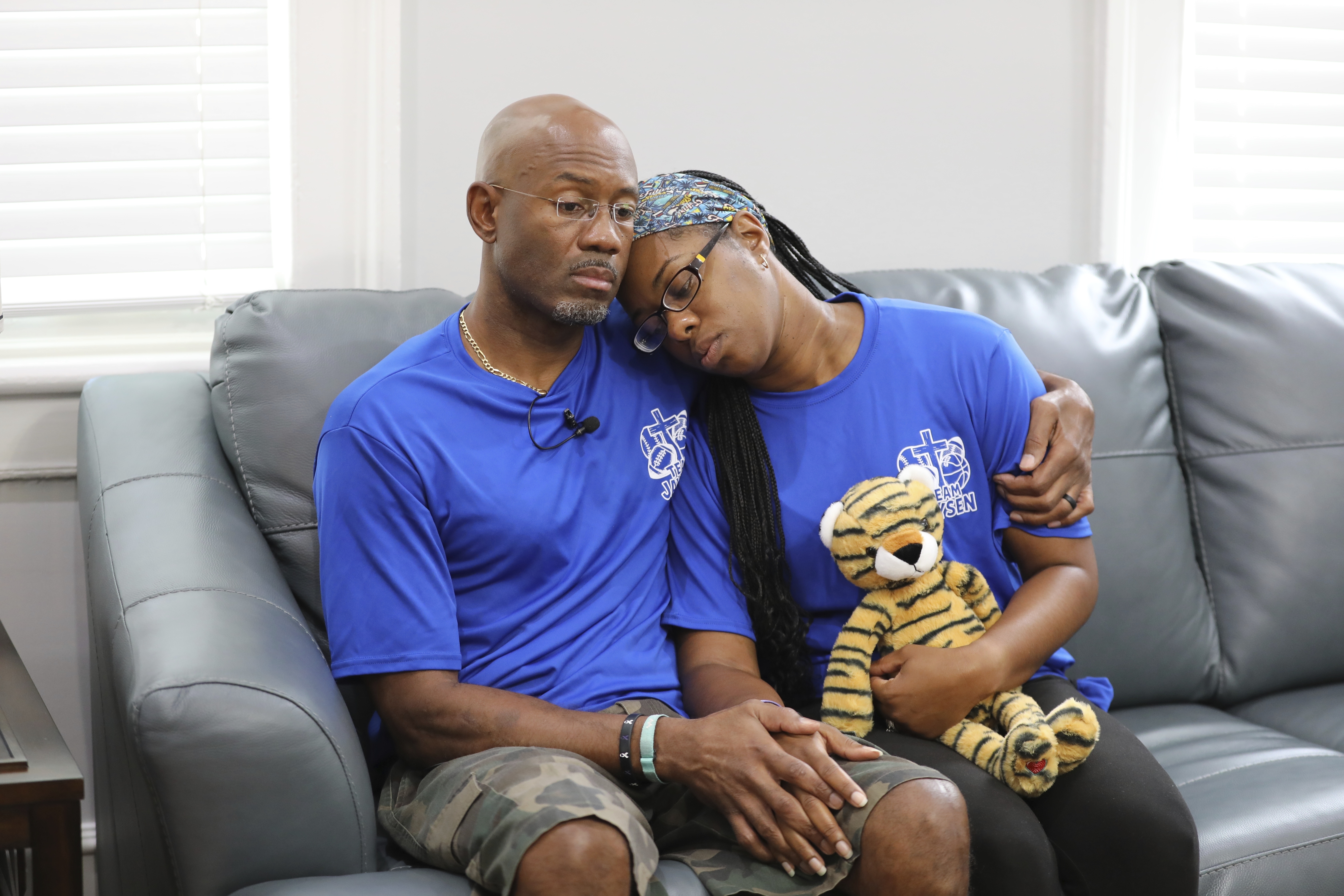 Clarence and Ebony Carr hug as they talk about the death of their son from a brain-eating amoeba he got at a popular South Carolina lake on Tuesday, July 29, 2025, in Columbia, S.C.. (AP Photo/Jeffrey Collins)