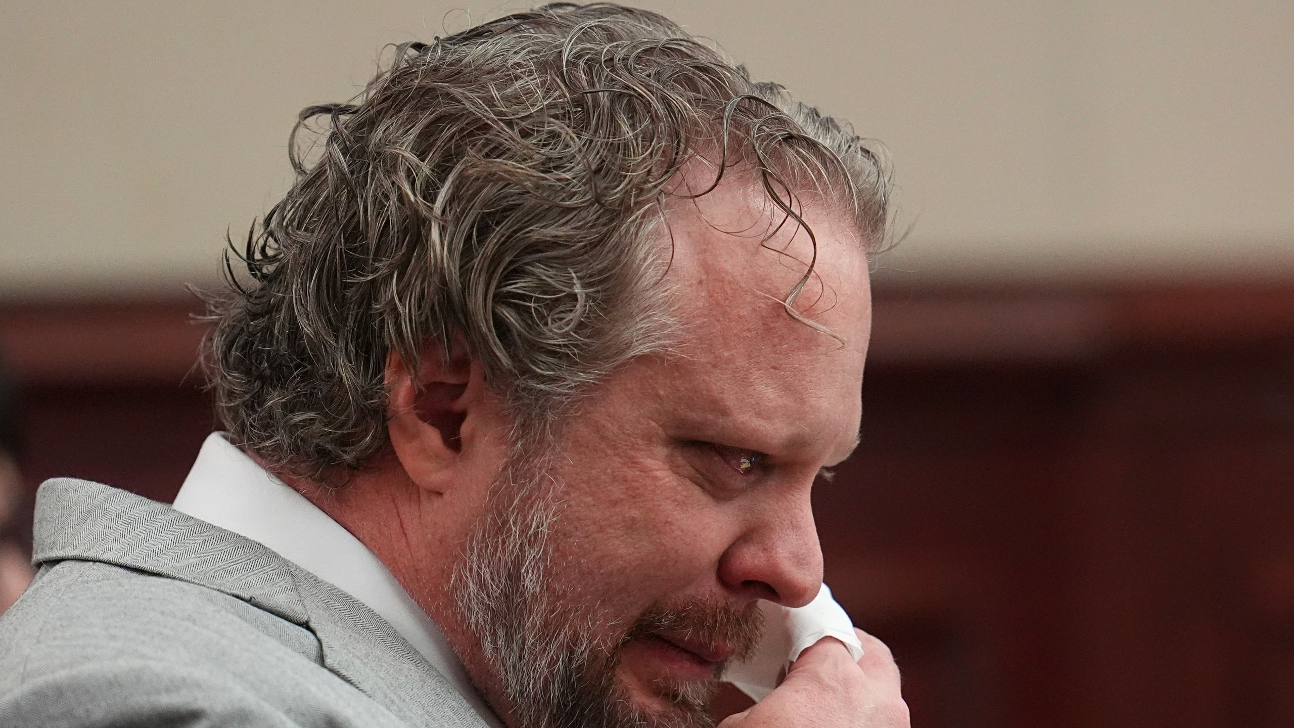 Dentist James Craig reacts during closing arguments in his murder trial in district court in Arapahoe County Tuesday, July 29, 2025, in Centennial, Colo. (AP Photo/David Zalubowski, Pool)