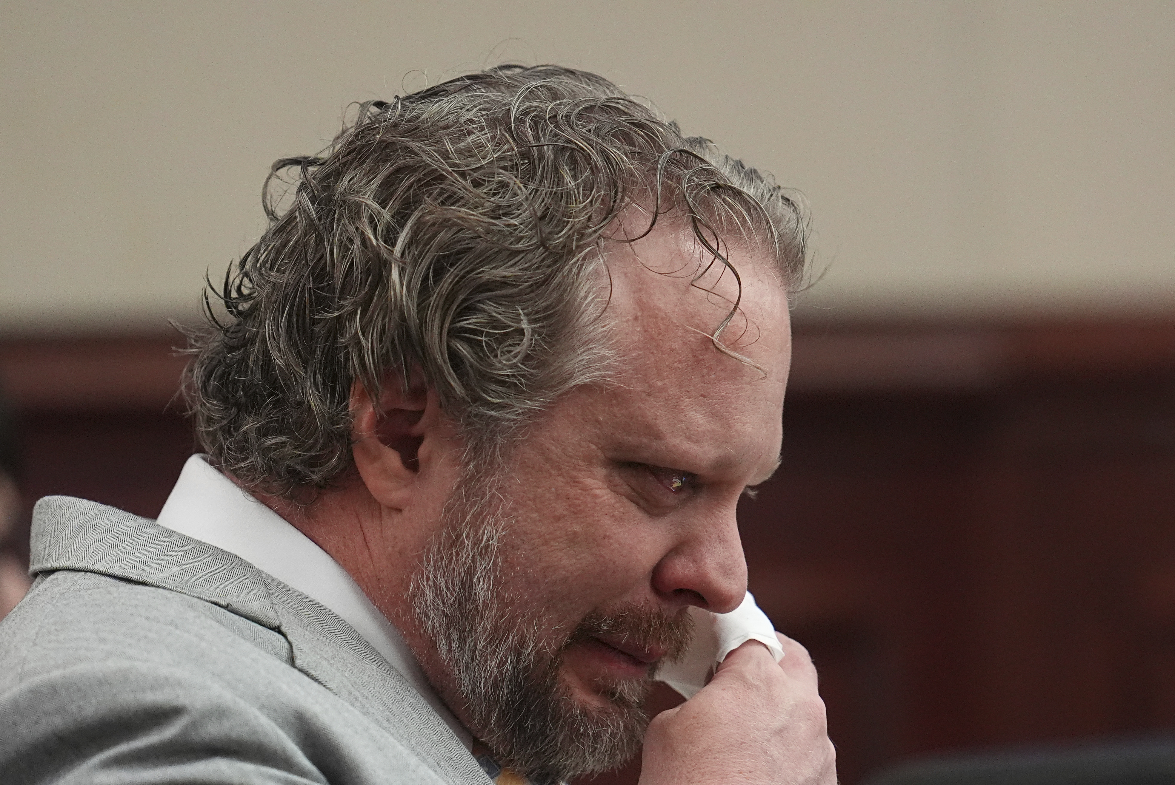Dentist James Craig reacts during closing arguments in his murder trial in district court in Arapahoe County Tuesday, July 29, 2025, in Centennial, Colo. (AP Photo/David Zalubowski, Pool)